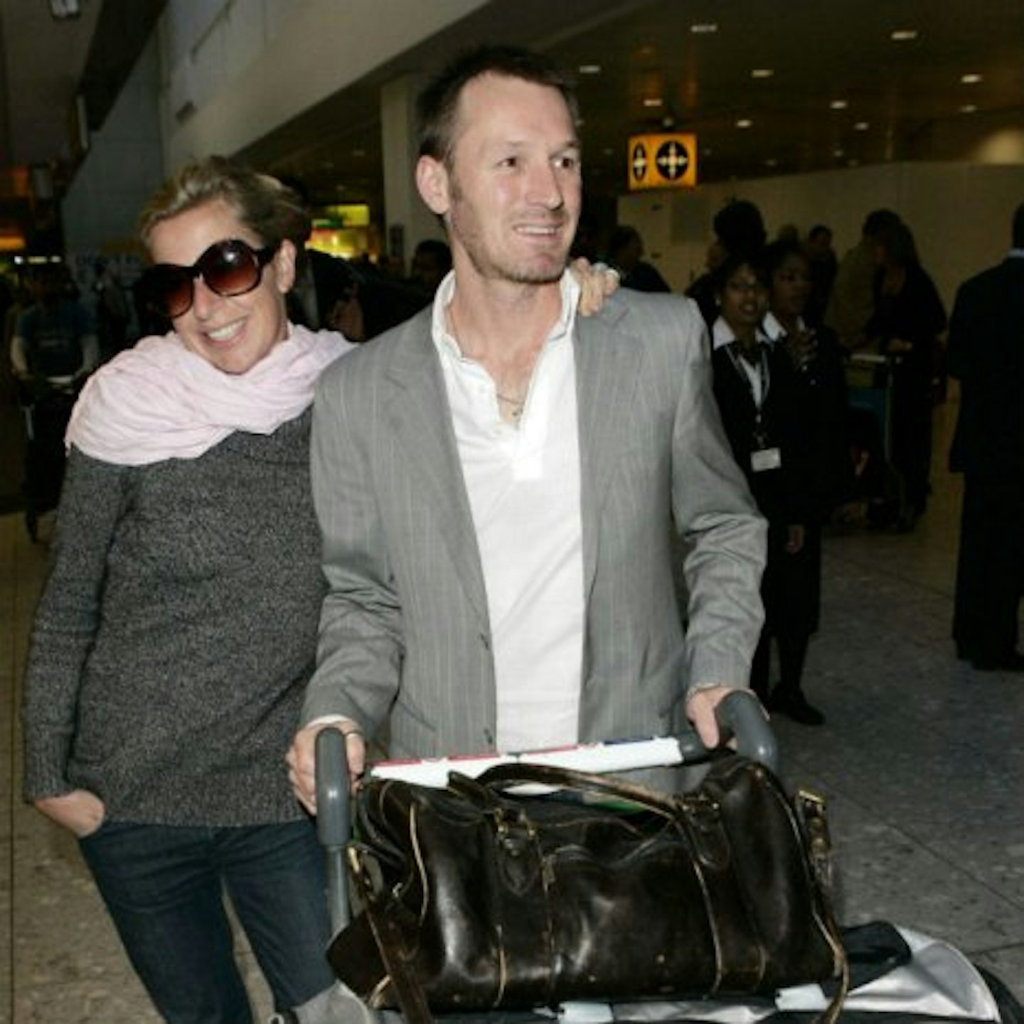 Katie pictured here with her husband, Mark Cross