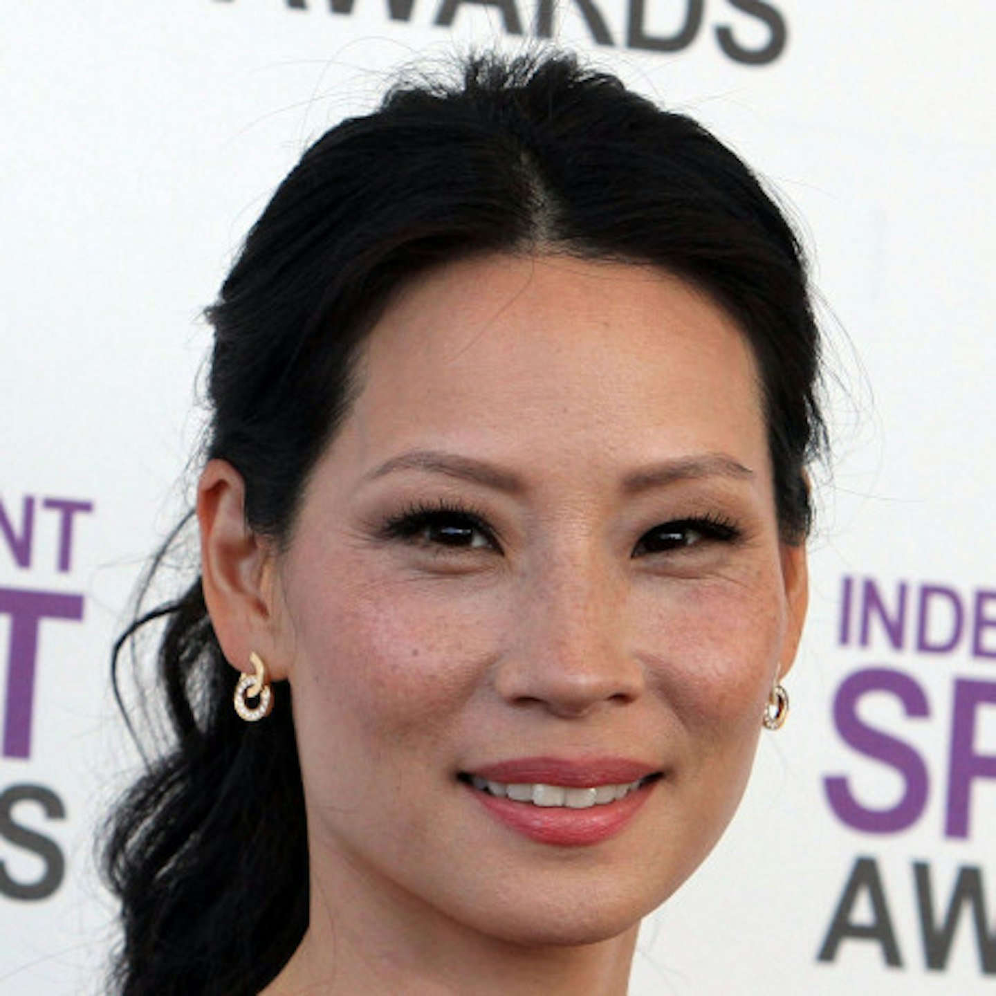 Lucy Liu has always been proud of her pretty freckles