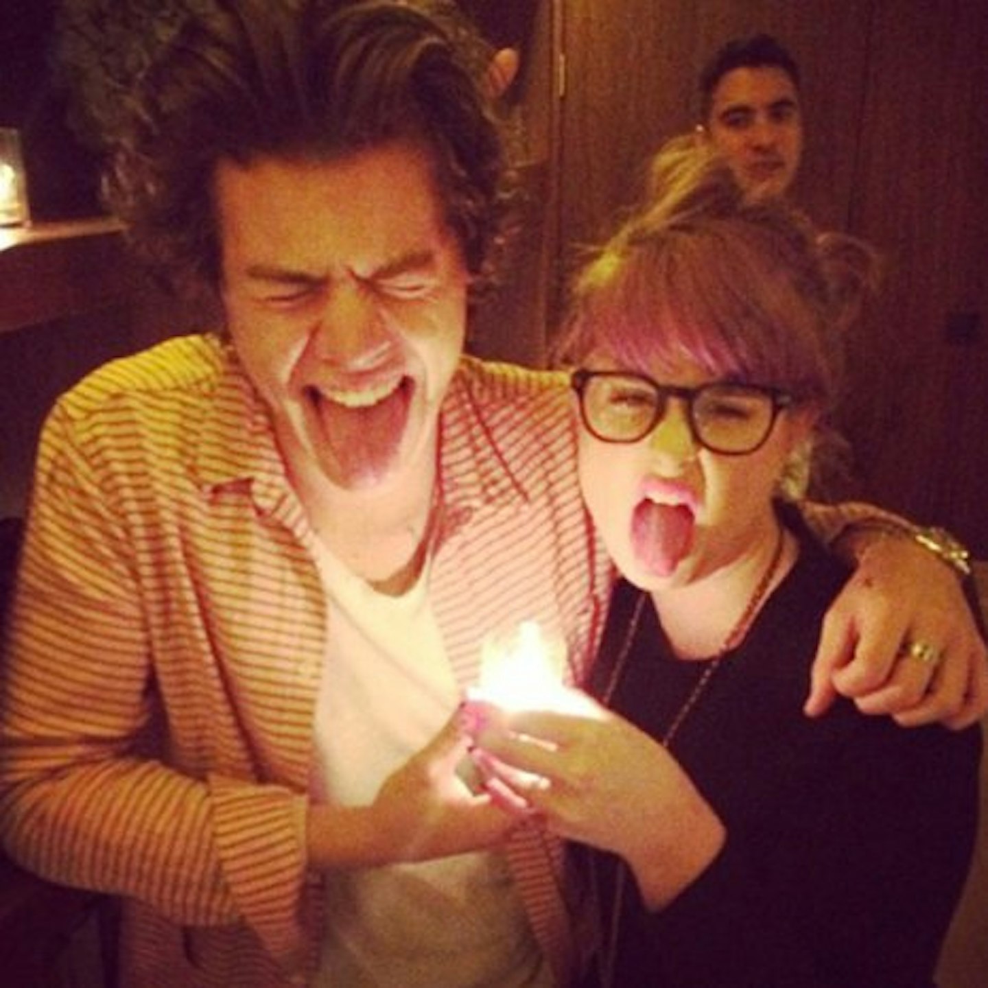 Harry Styles and Kelly Osbourne, psoting up an Insta-storm.