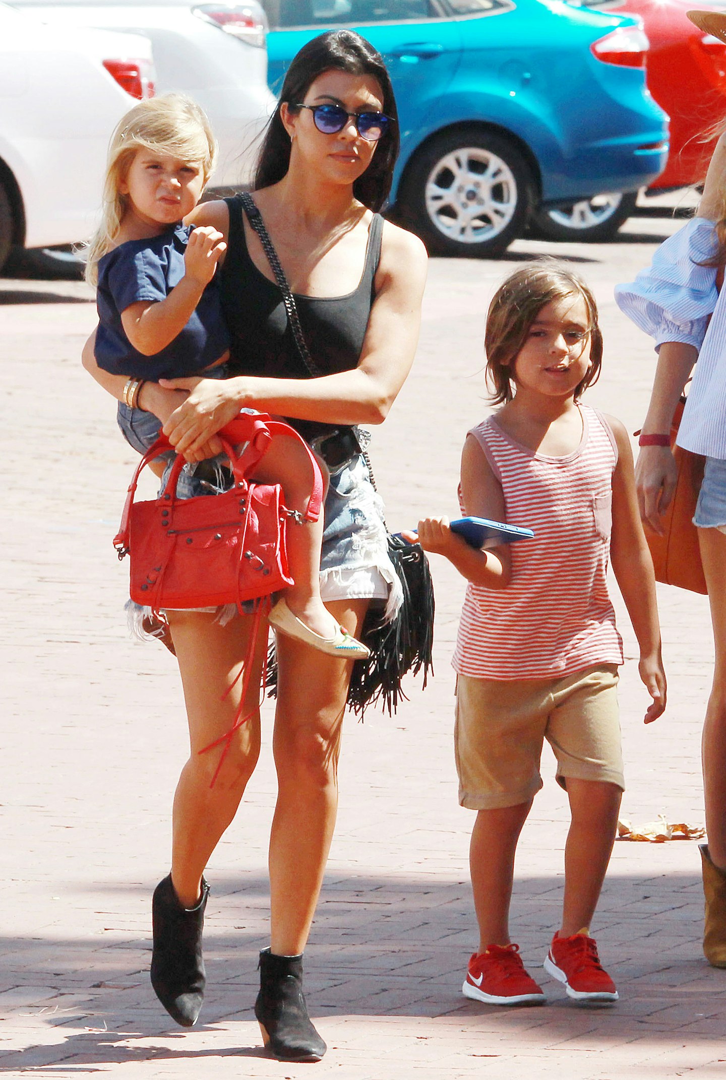 Kourtney with Penelope and Mason.