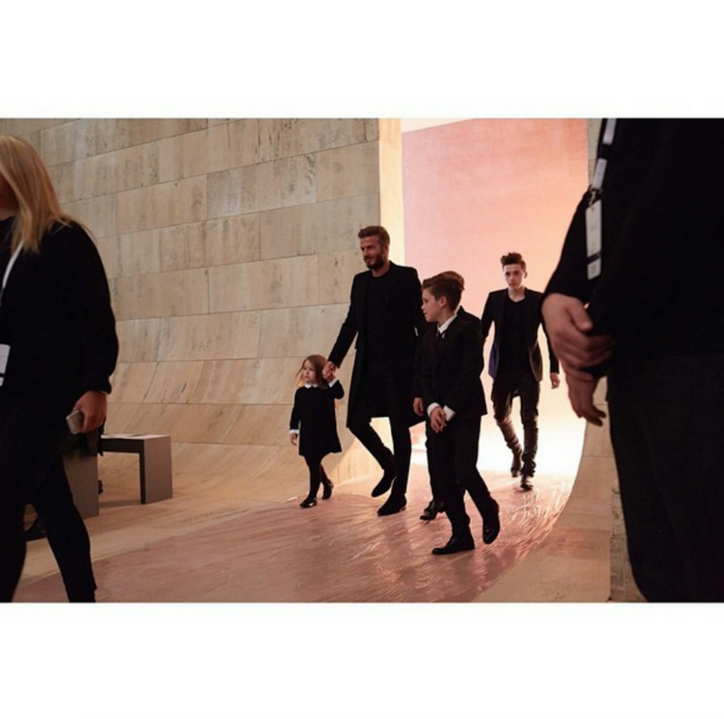 Mum Victoria posted this picture of her boys and daughter Harper attending one of her fashion shows. She captioned it: "My babies x love having my family with me x vb #NYFW #AW15."