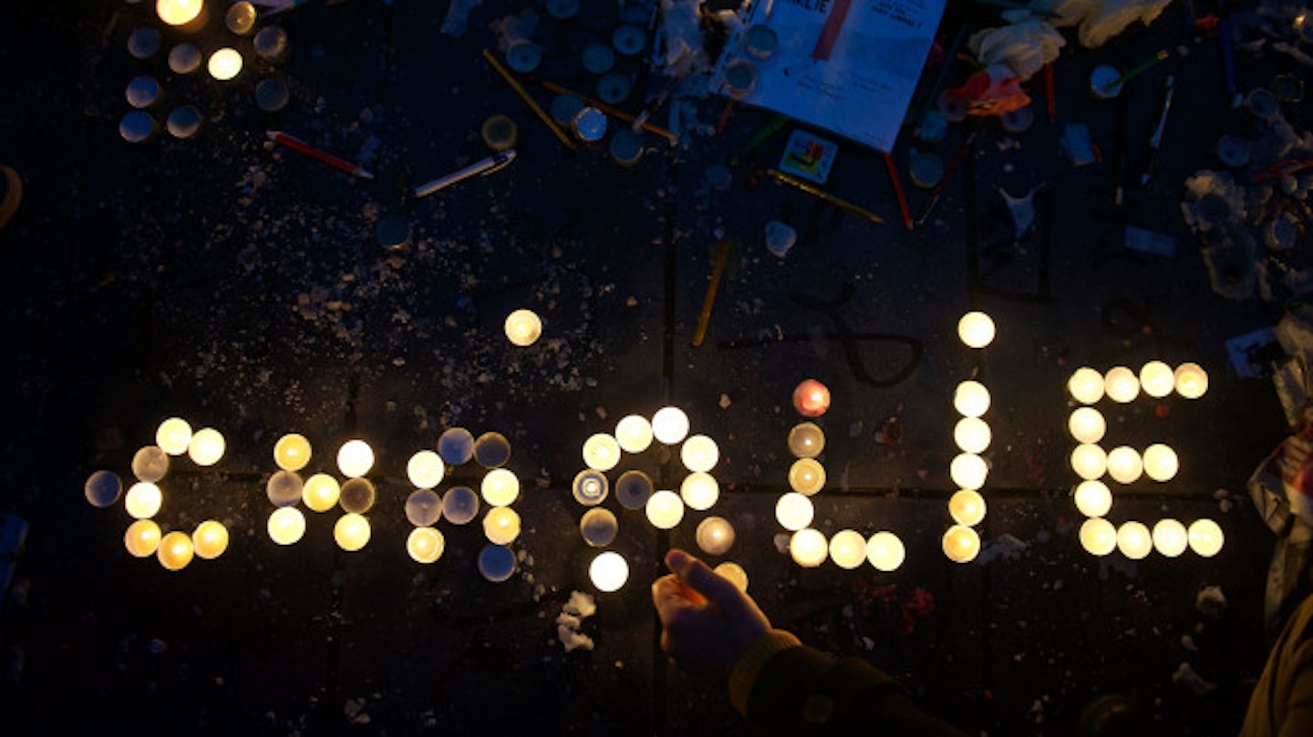 A candle lit memorial left for the victims of the last weeks shootings.