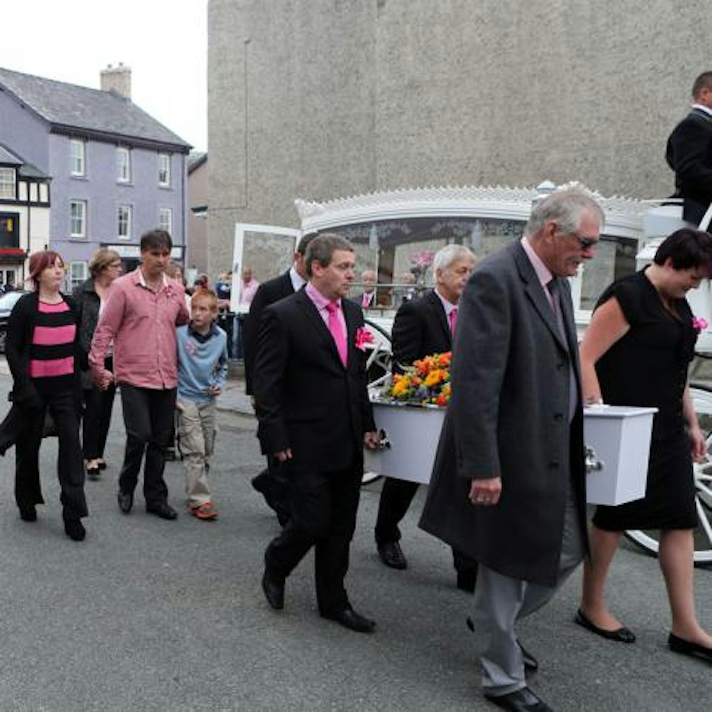 April's coffin was pulled in a white carriage