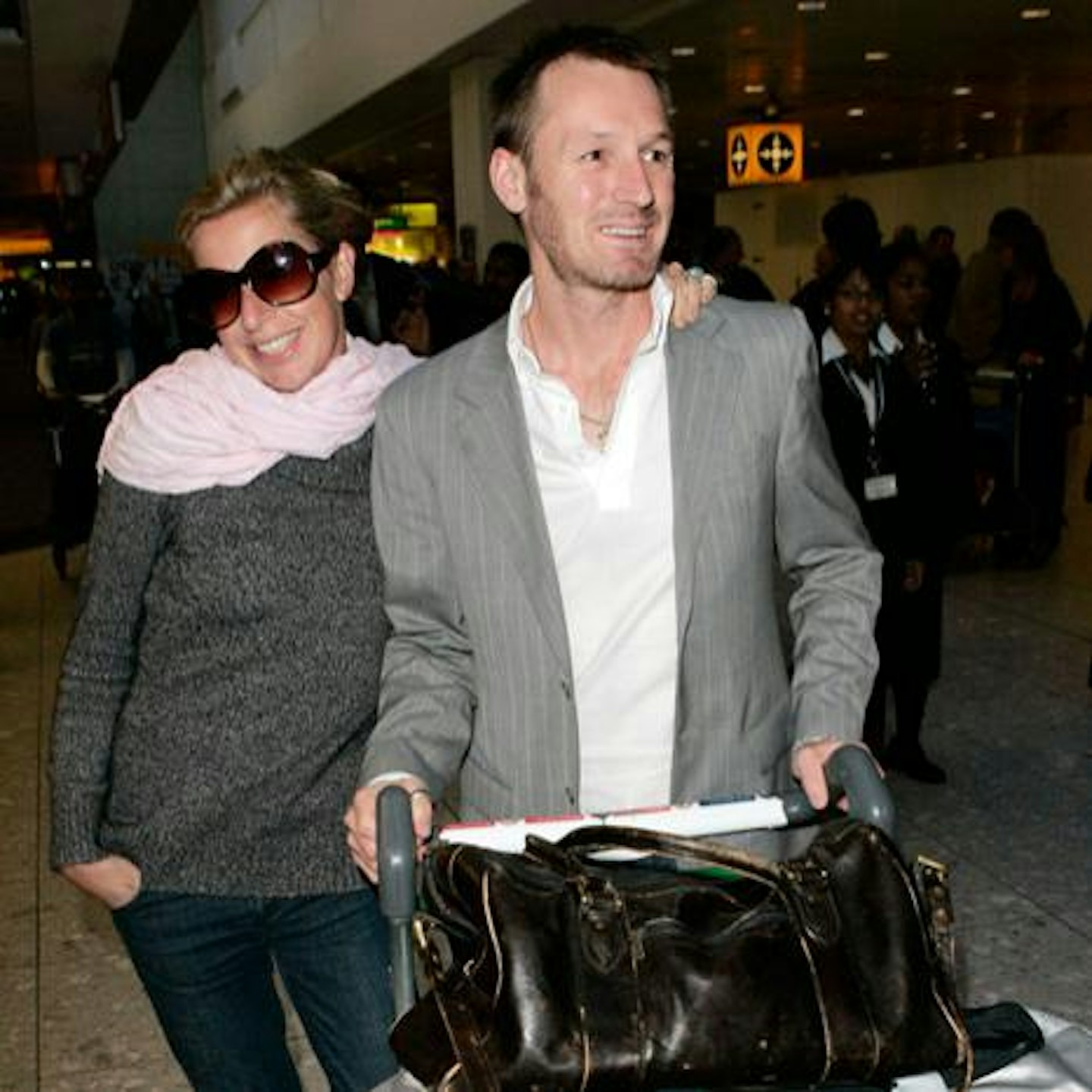 Katie is married to Mark Cross, pictured