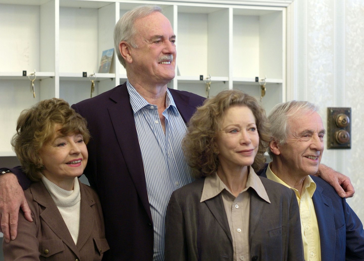Prunella, left, with the cast of Fawlty Towers in 2009