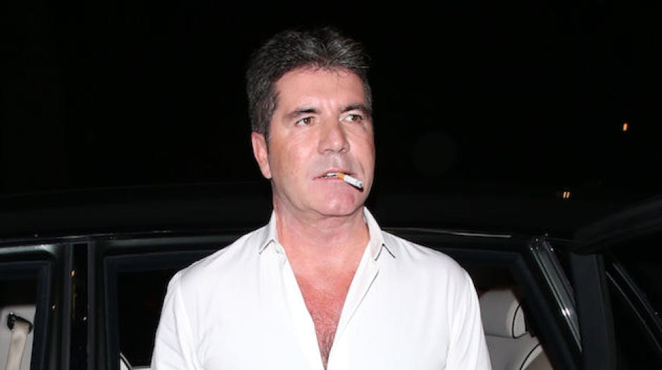 simon cowell cigarette Simon Cowell reportedly pays £100 per cigarette so that he can smoke in the  X Factor studios | Celebrity