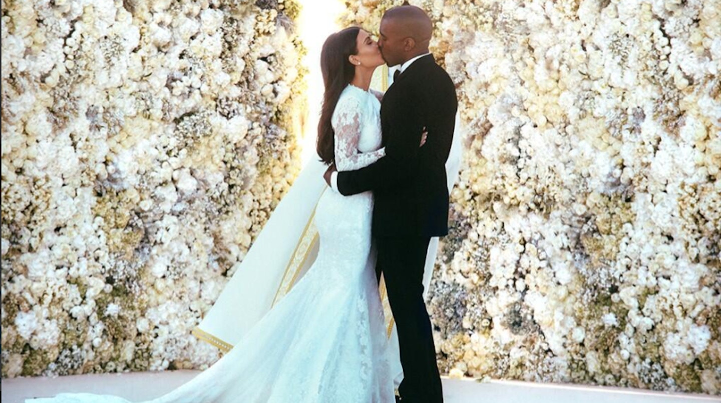 Kim and Kanye wedding kiss