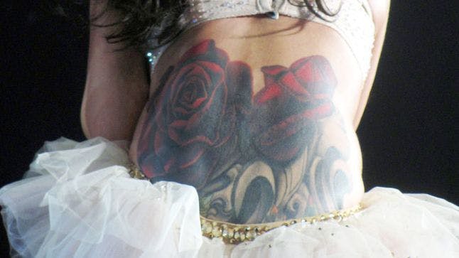 Celebritattoo — Cheryl Cole | Small unalome tattoo on Cheryl...