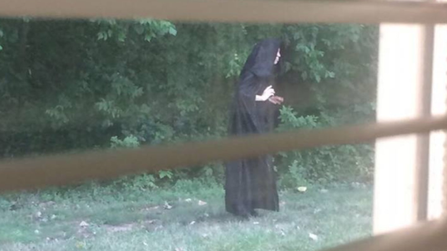 Creepy cloaked figure spotted leaving raw meat in children’s playgrounds
