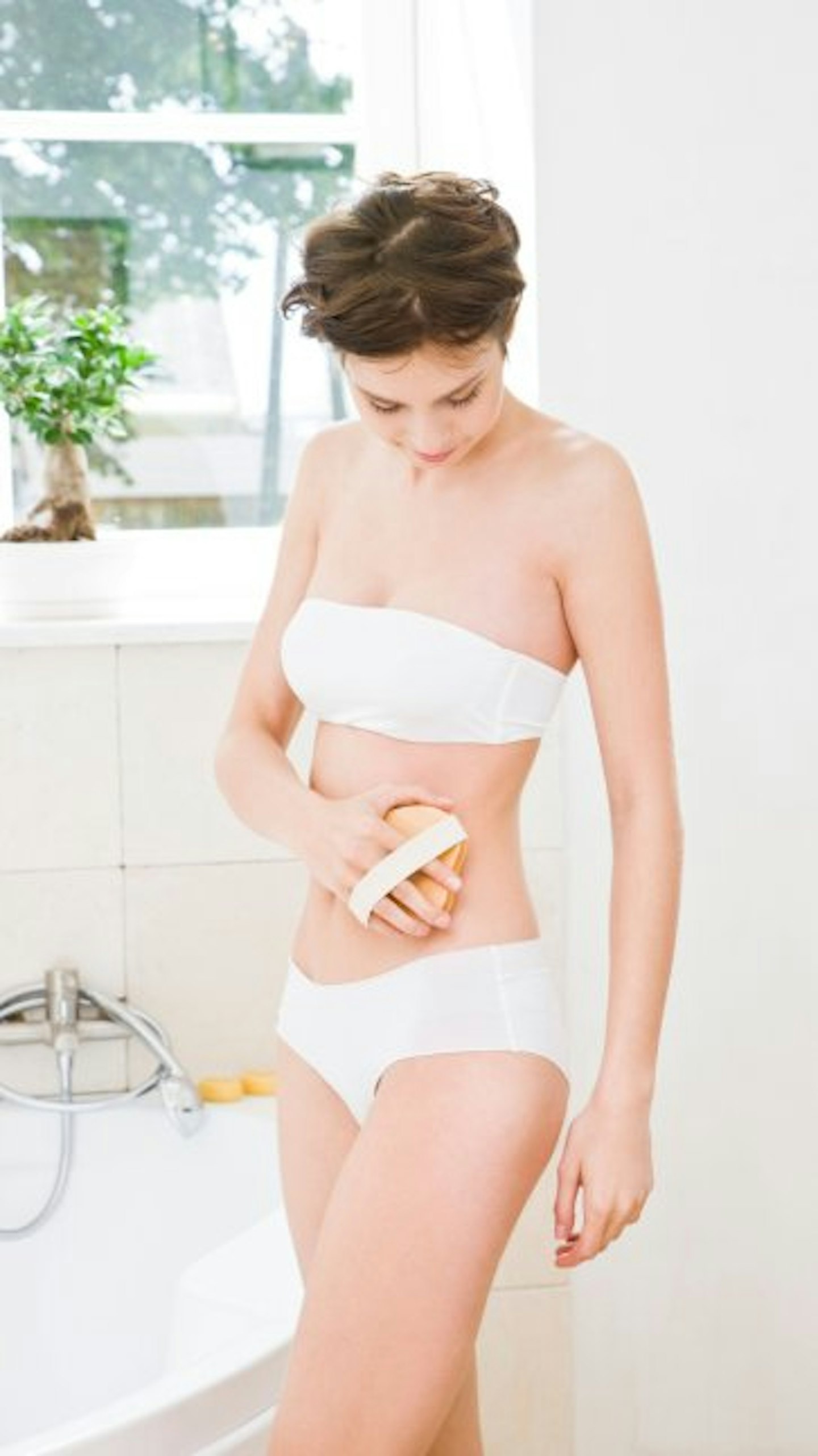 A body brush is a great way to improve the appearance of cellulite