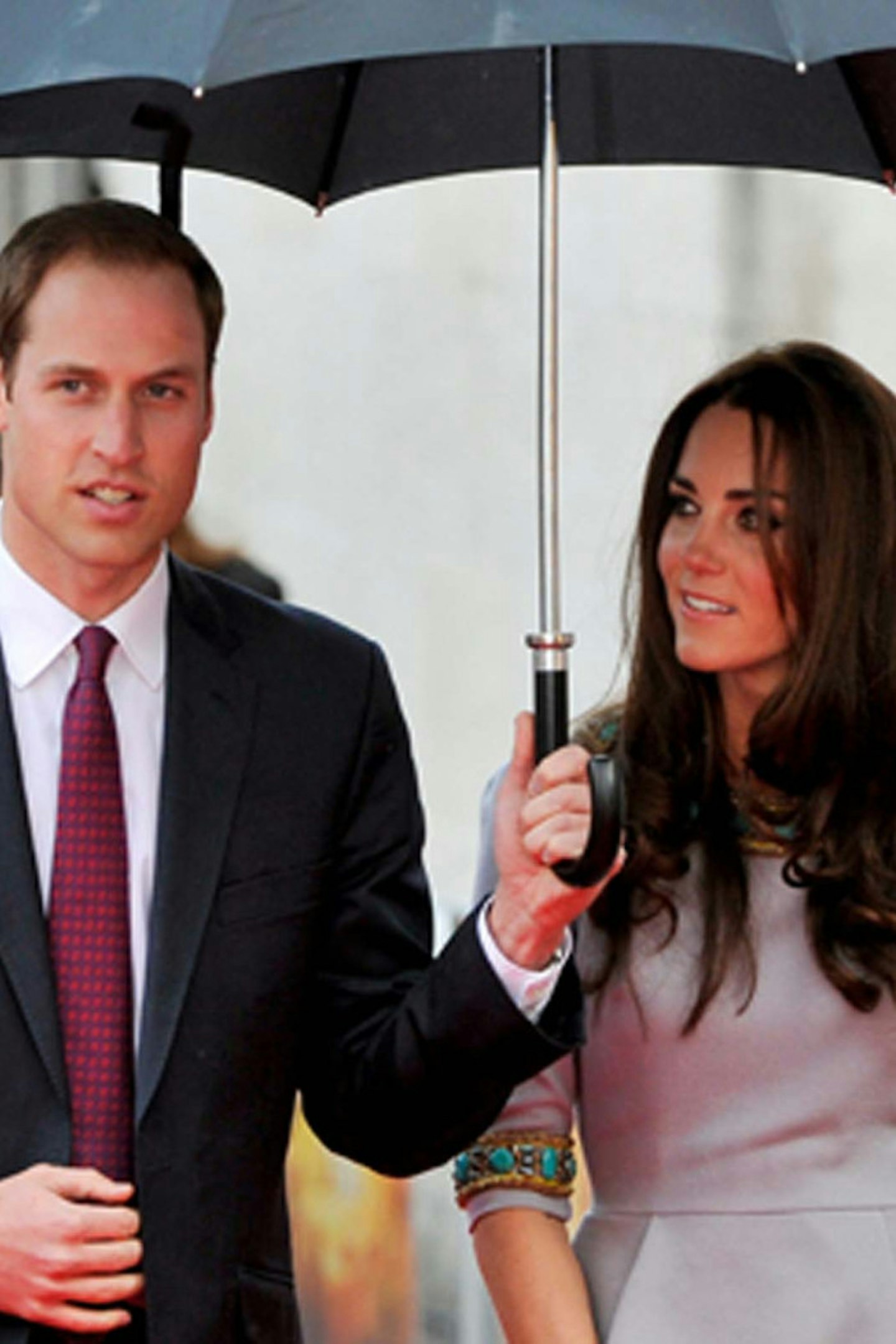 18-17. Wills protecting his wife's glossy hair in April 2012