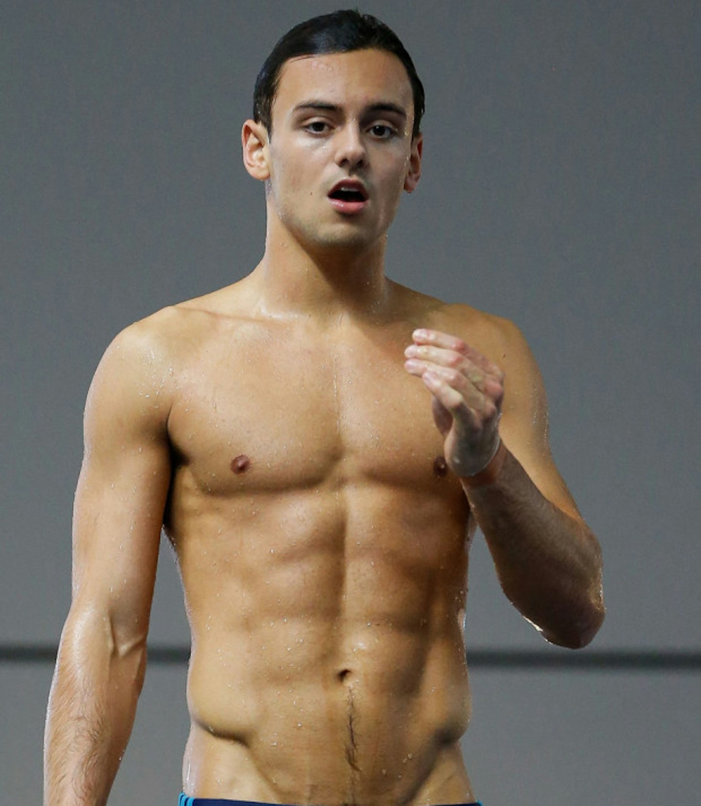 Tom Daley looking swell by the pool