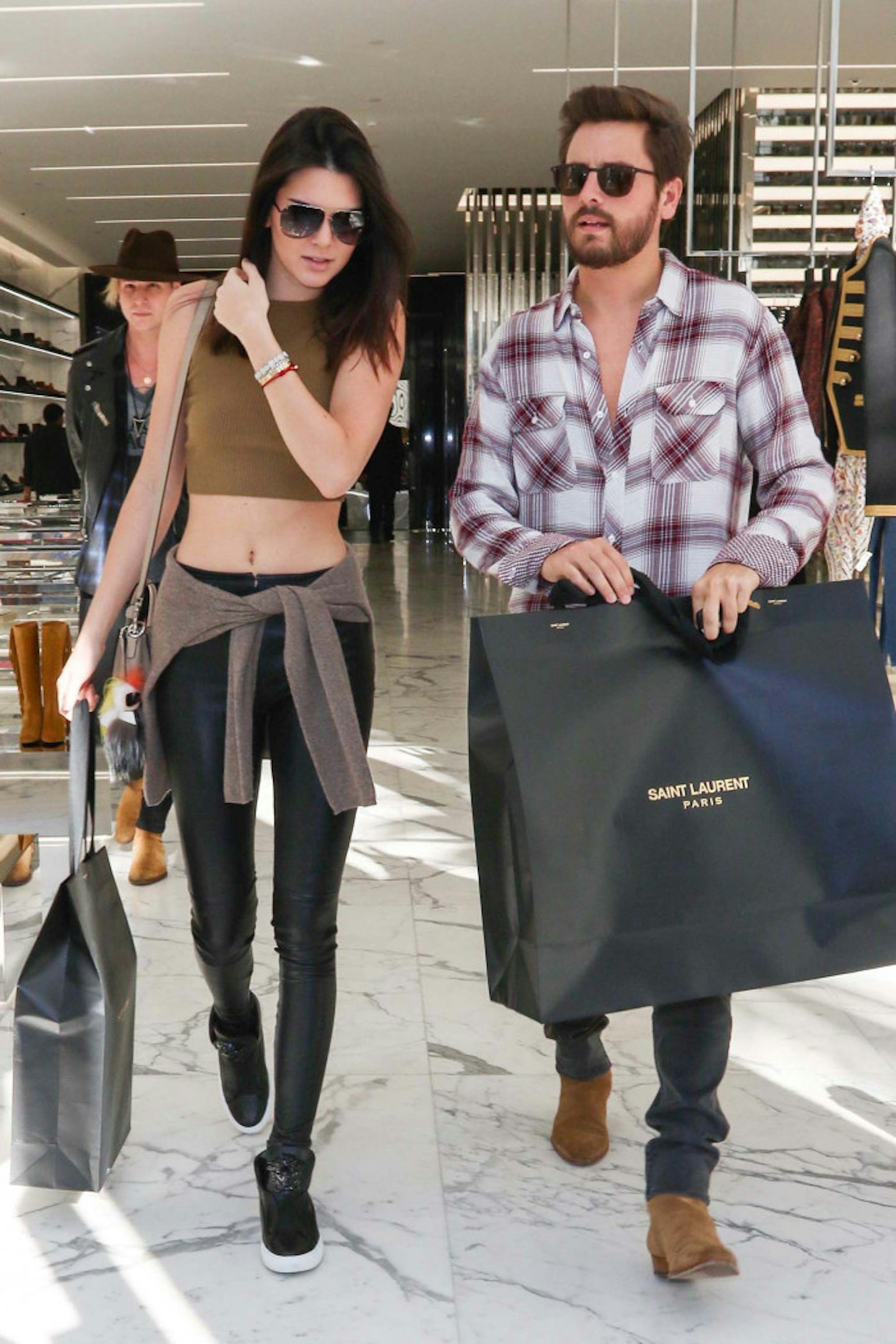63-Kendall Jenner and Scott Disick are seen on December 23, 2014