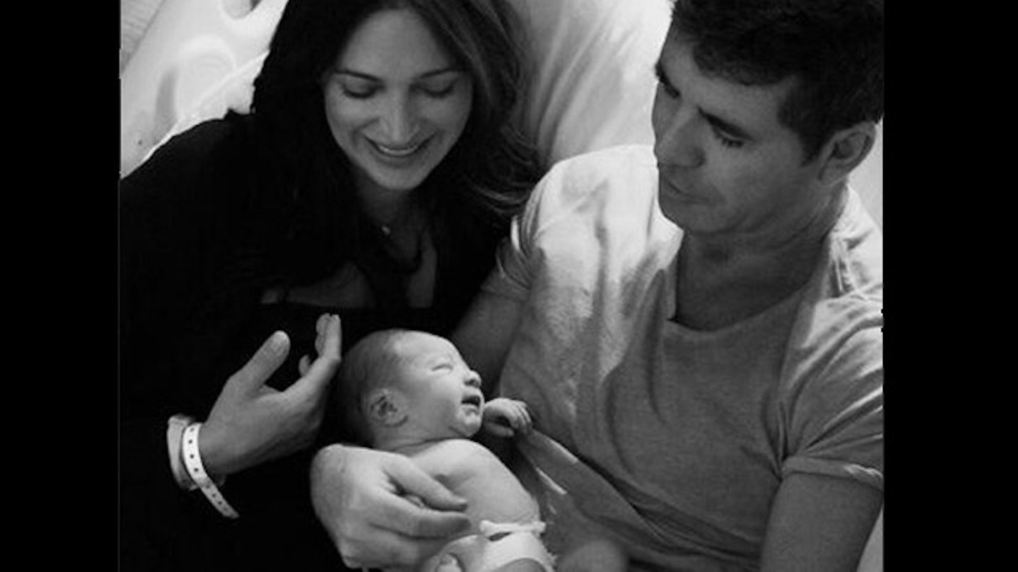 Simon with partner Lauren Silverman and son Eric