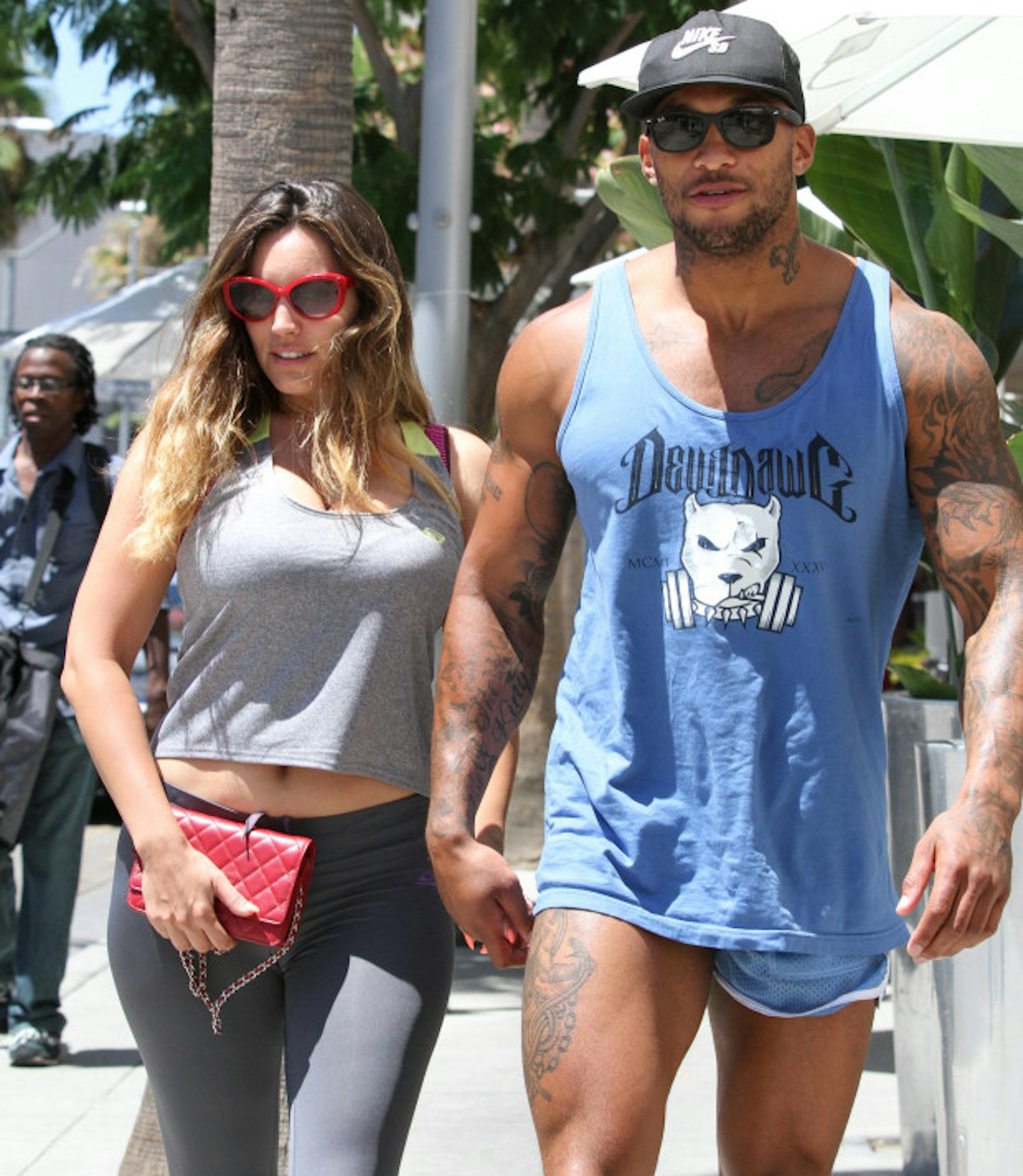 Look! David and his tiny shorts were once so happy with Kelly!