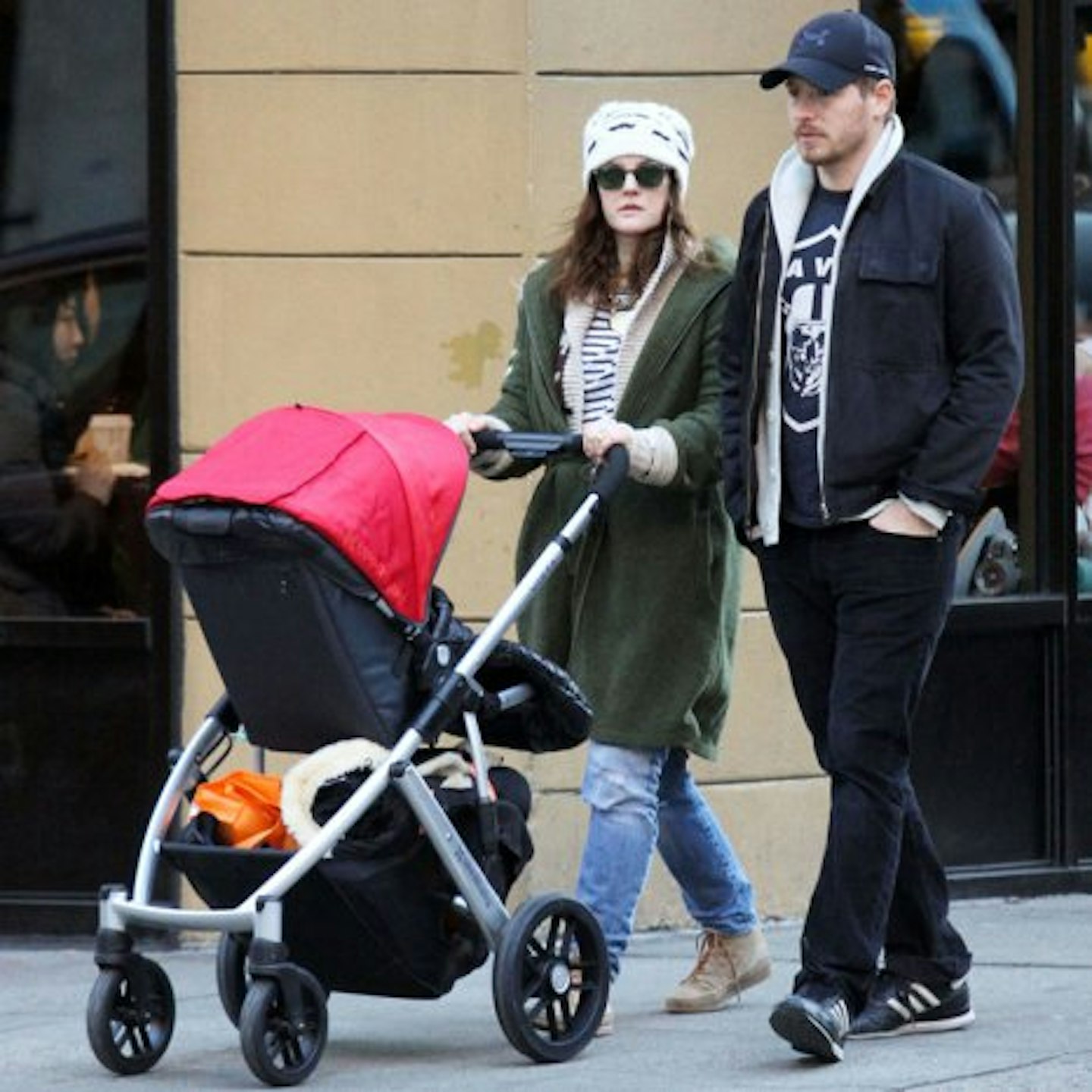 Drew and Will take baby Olive out for a stroll