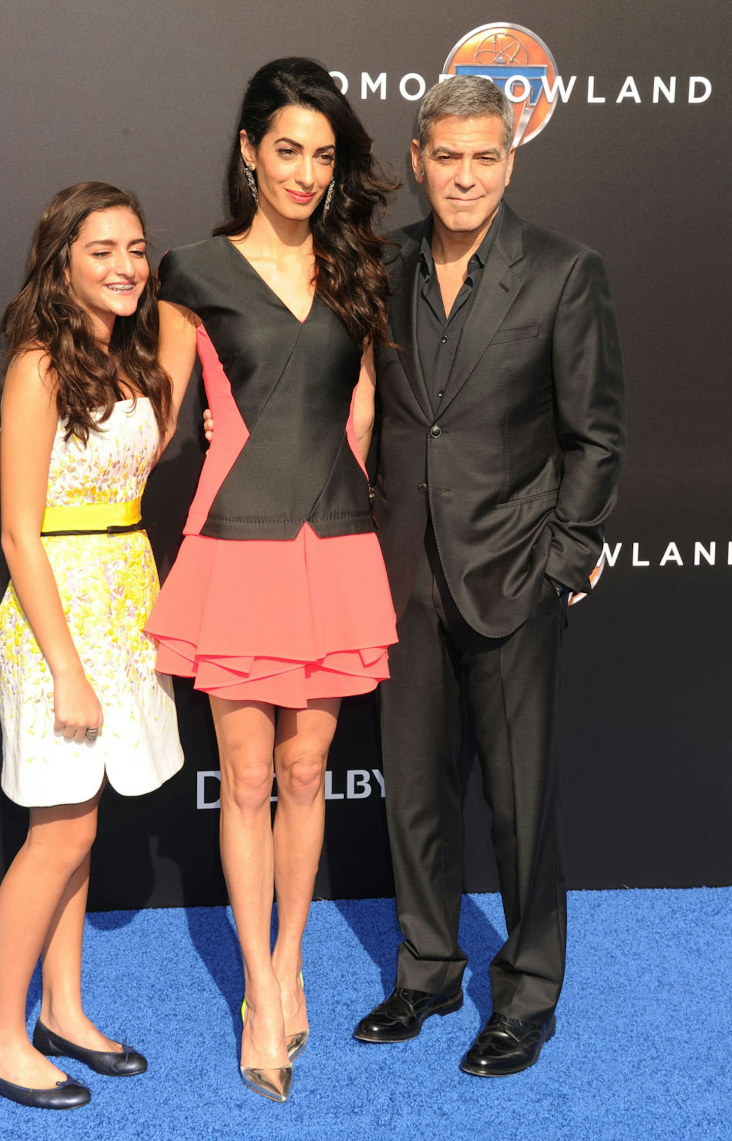 George Clooney with his wife Amal and her daughter Mia.