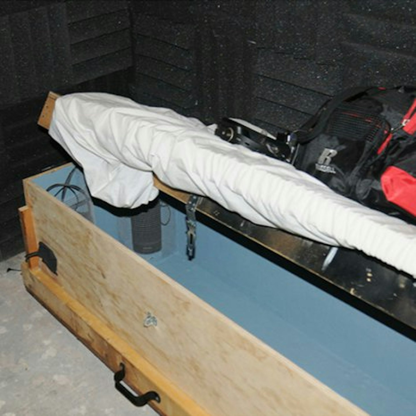 Pictures released by U.S. District Court showing evidence, including a homemade coffin, found in the home of Geoffrey Portway.