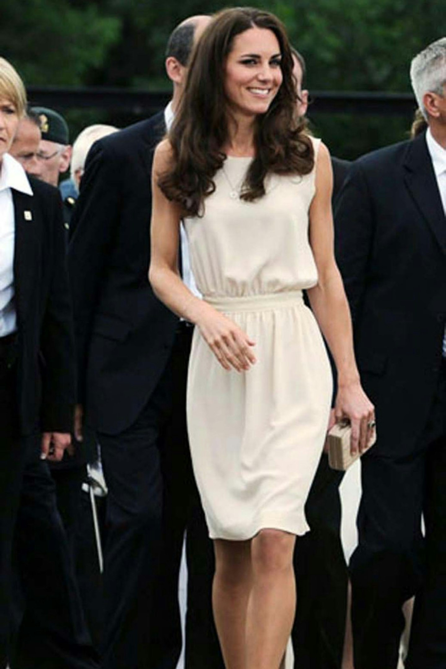 Kate Middleton departs Jean Lesage International Airport in Quebec City wearing Joseph dress, July 2011