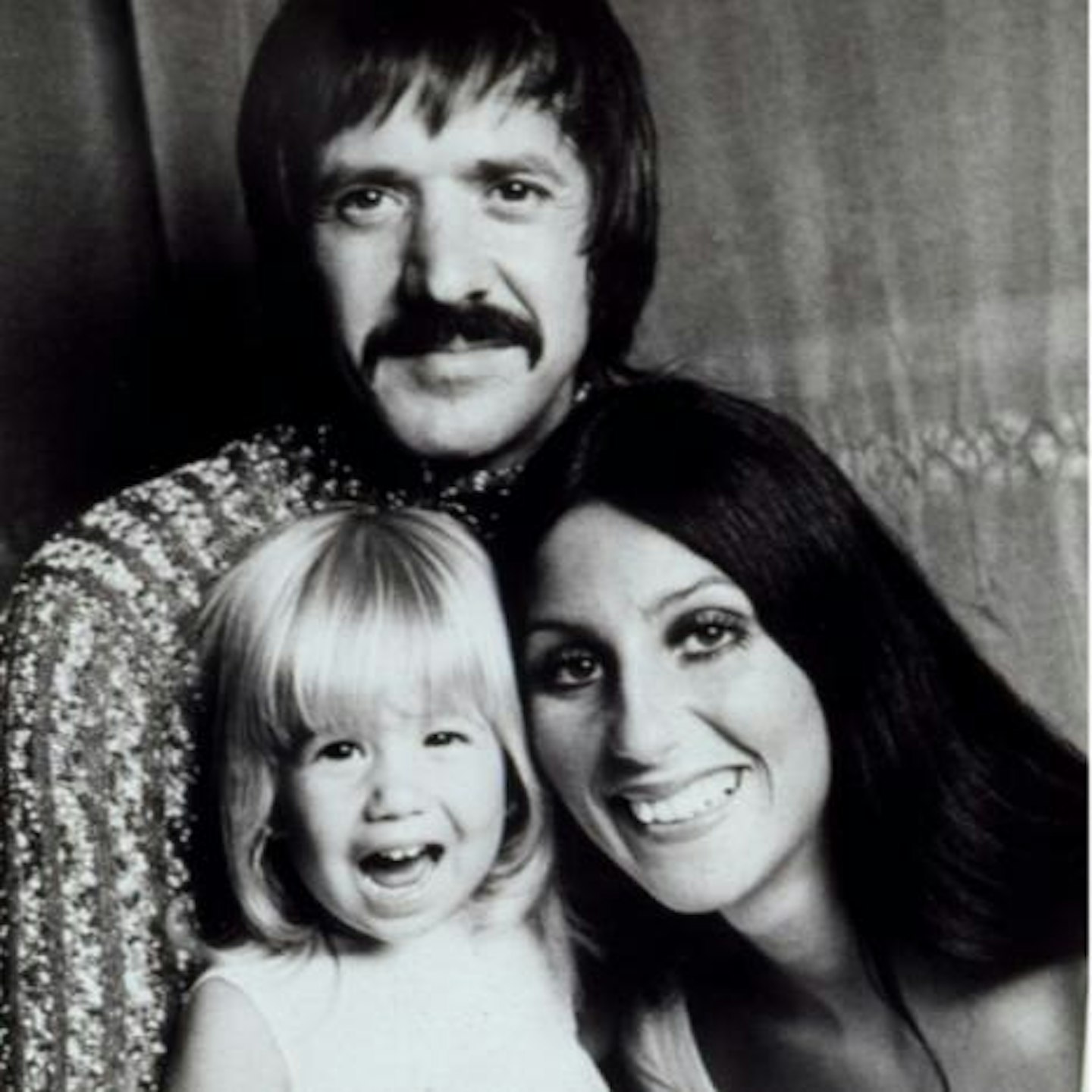 Cher pictured with husband Sonny and their daughter in 1972