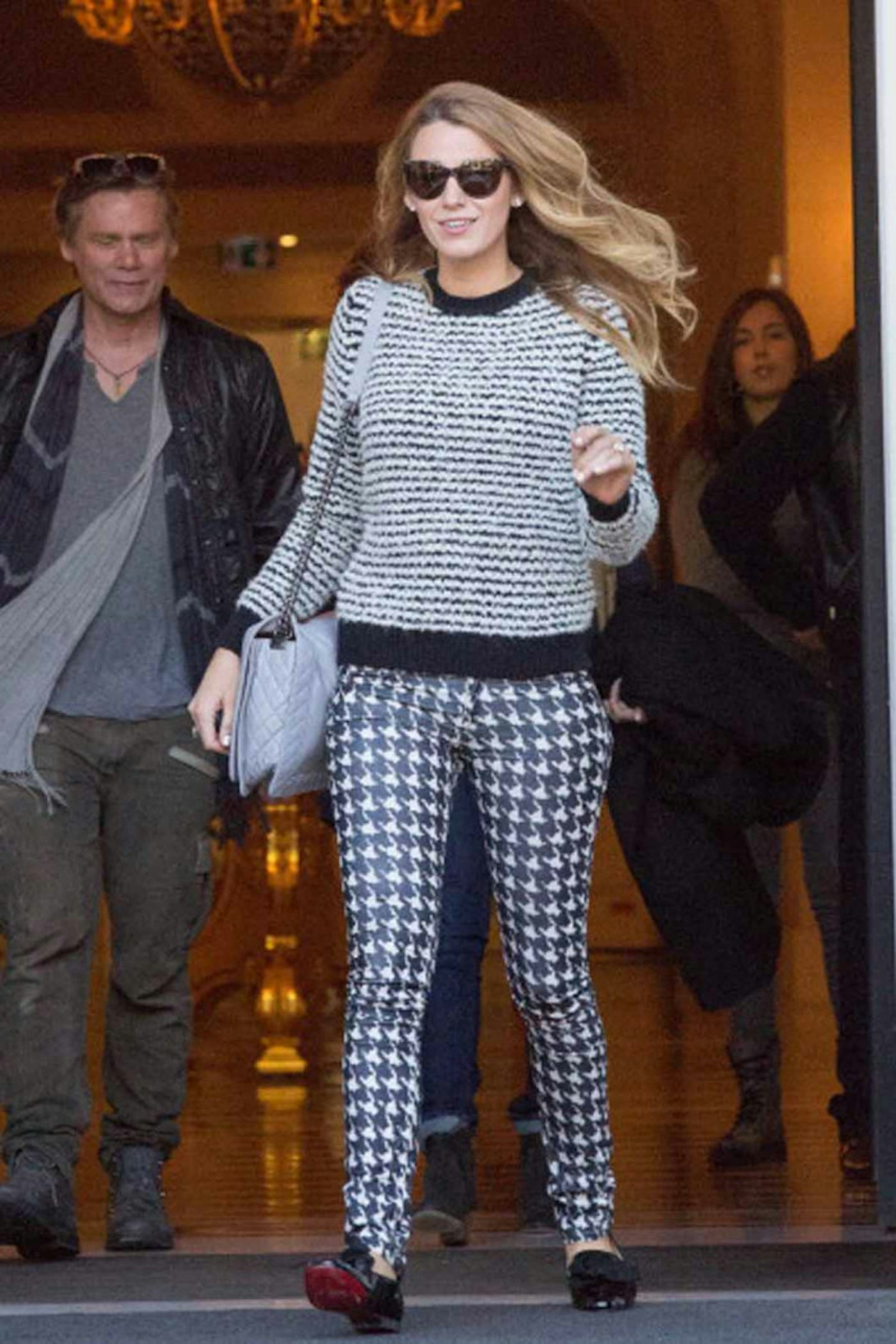 Blake Lively style dogtooth print trousers striped jumper