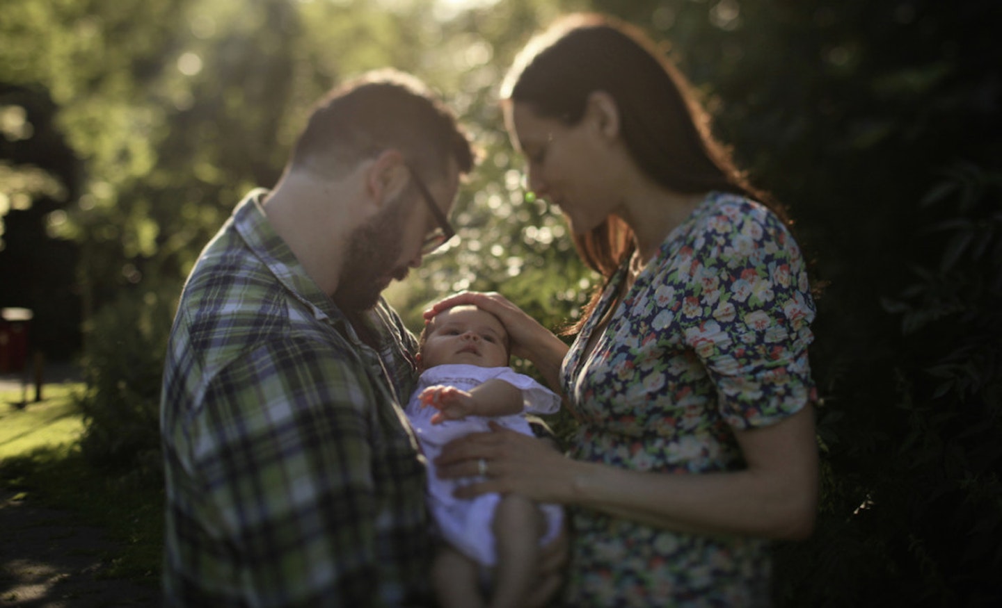 Angela and Mike are happy with their three person family