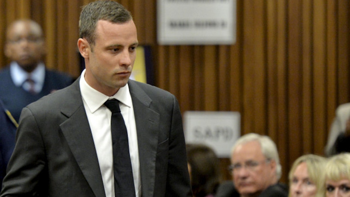 June Steenkamp is seen staring at Oscar as he enters court