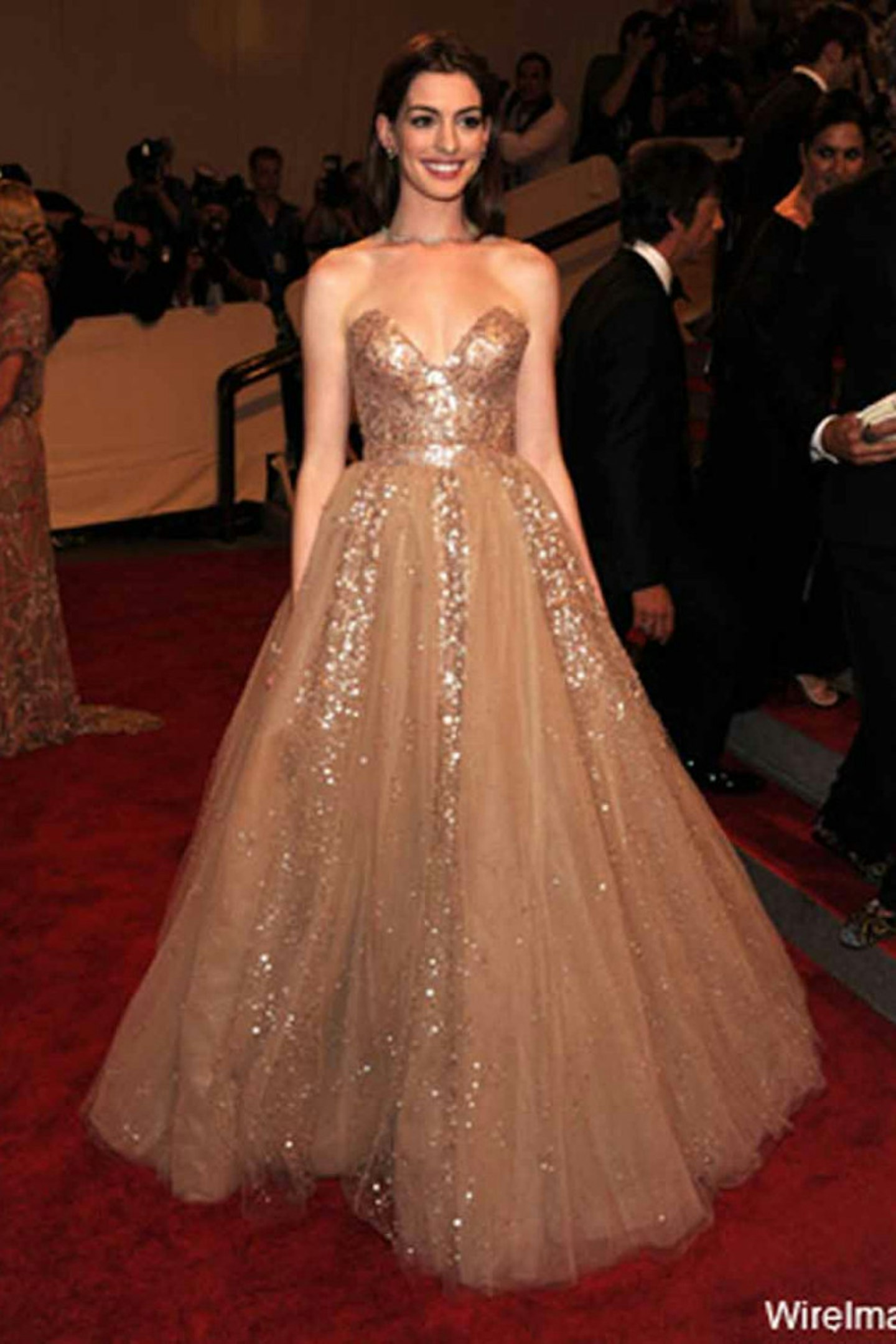 Anne Hathaway style oscar de la renta 2010 gold glitter dress