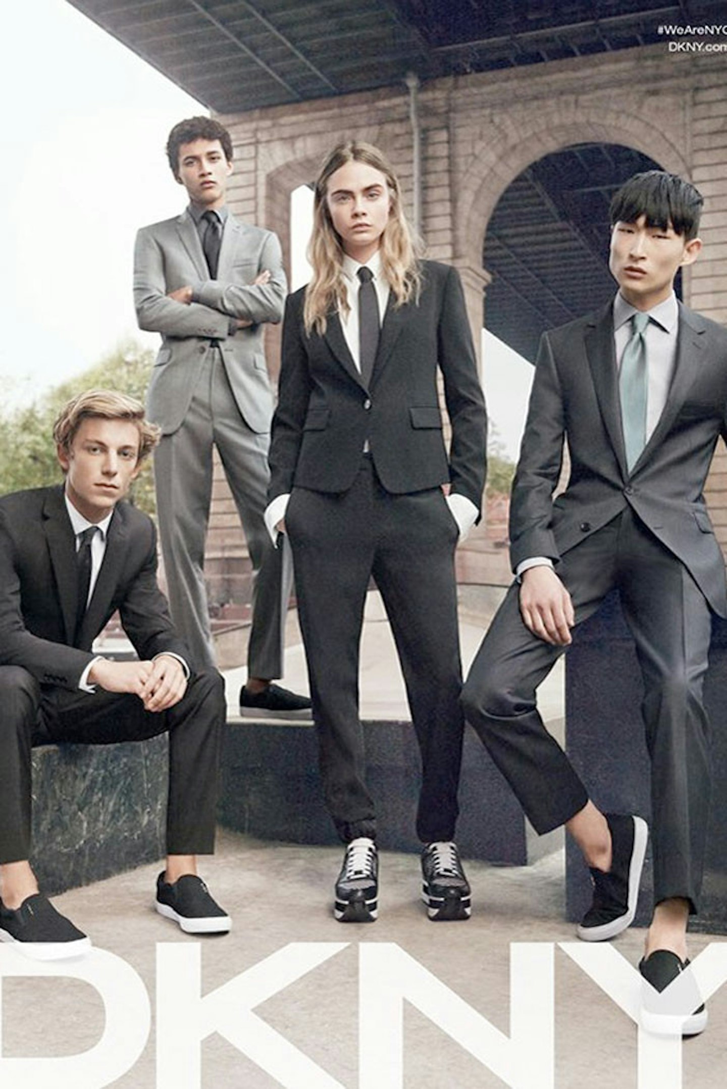 Cara Deleveingne suits up in DKNY's SS15 campaign