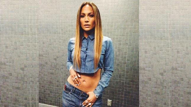 Jennifer Lopez shows off her amazing abs behind the scenes at 