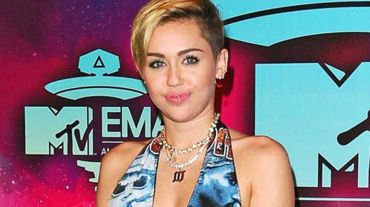 Miley Cyrus wearing Tupac and Notorious B.I.G