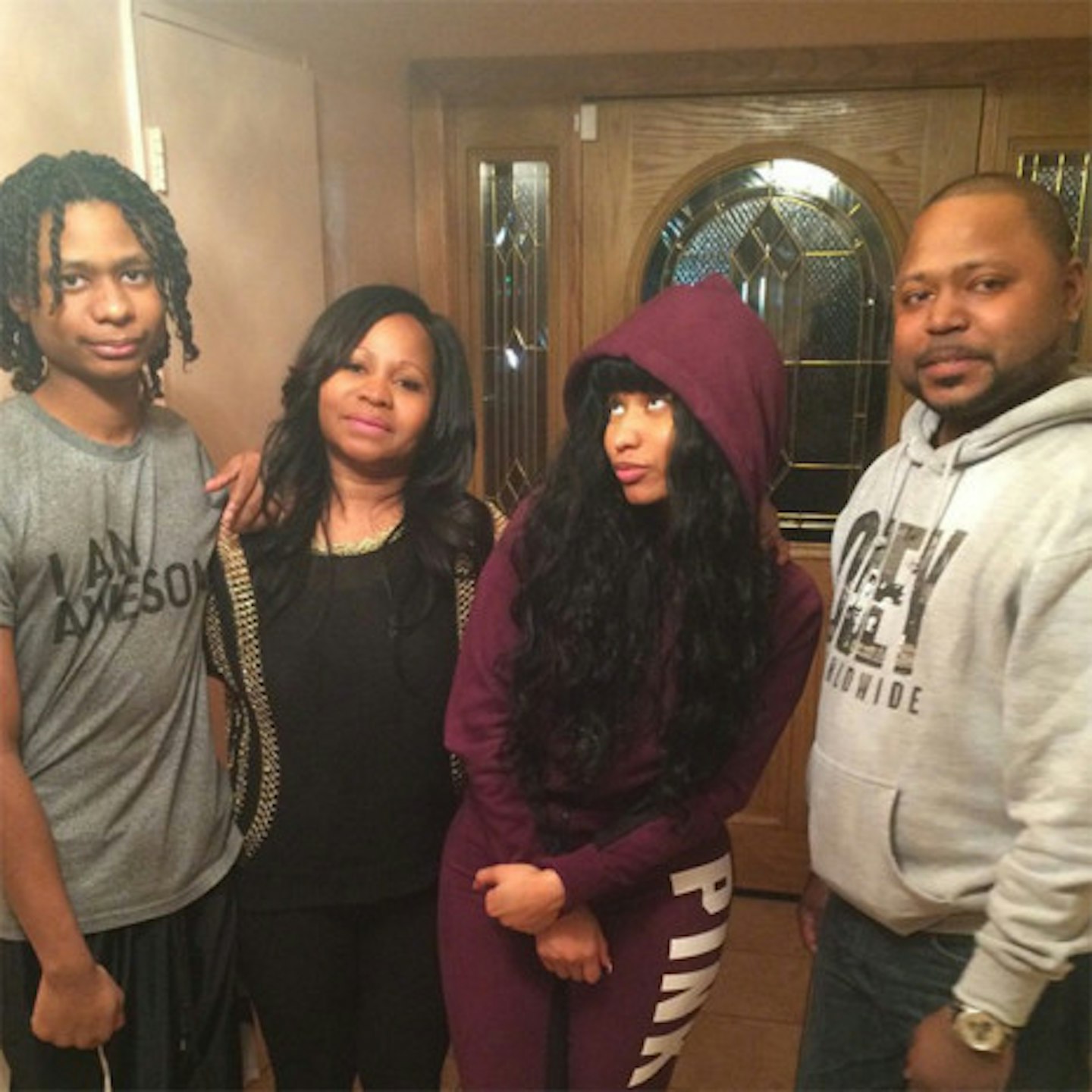Jelani, Nicki, their mother and younger brother Micaiah