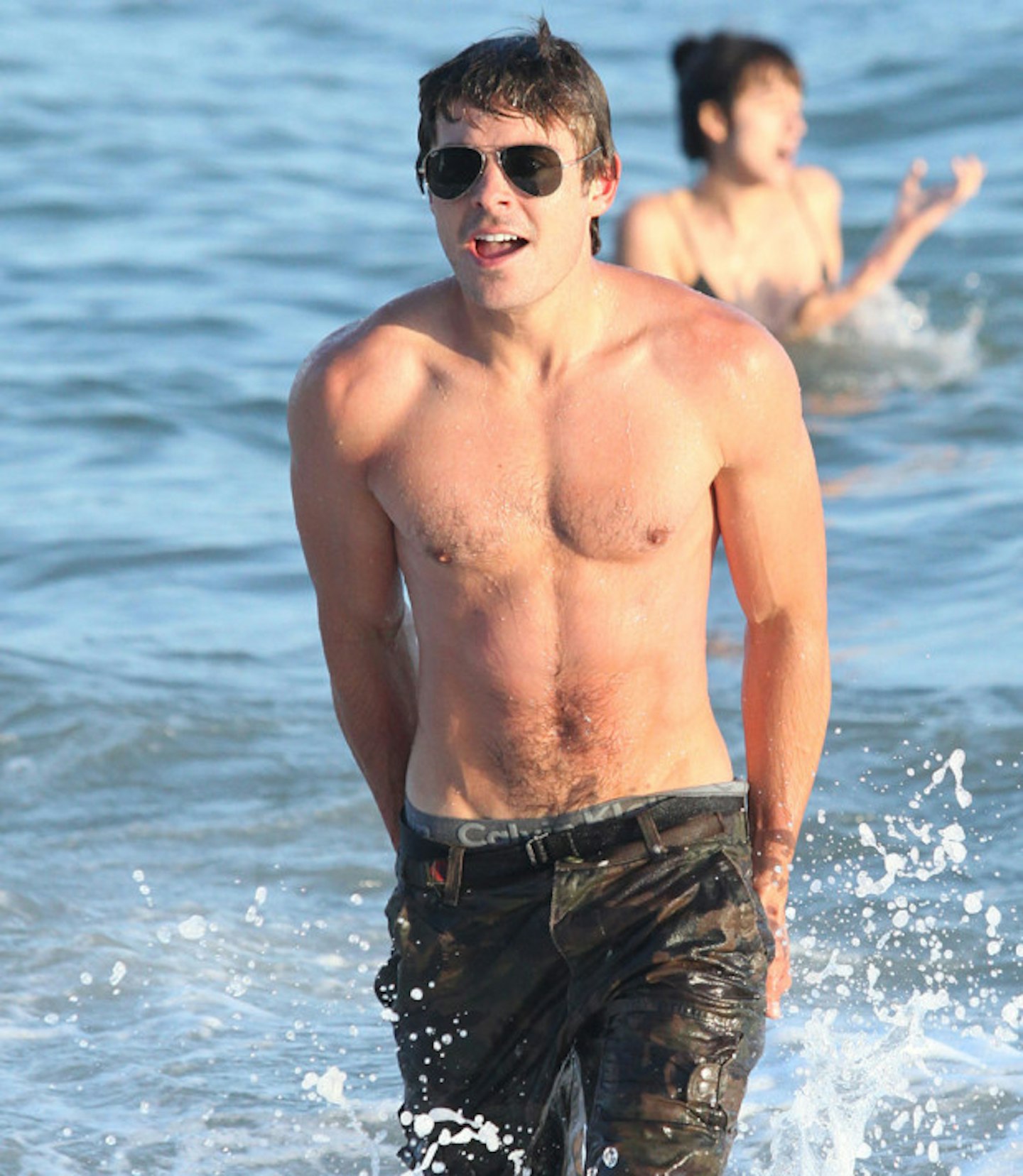 Zac Efron frolicking in the ocean