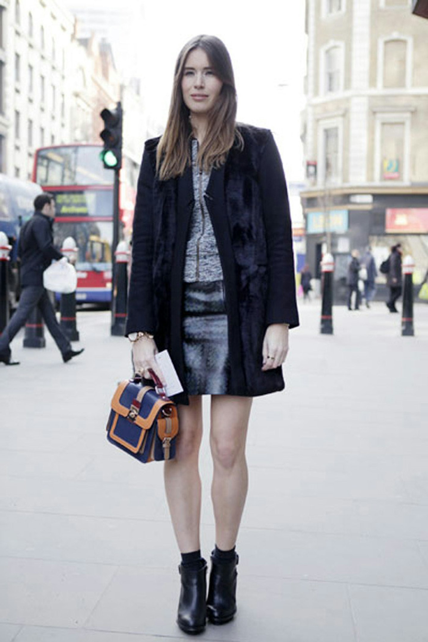 Lisa Haynes wearing a Warehouse coat, Gok Wan for Tu top, Christopher Kane skirt, Topshop shoes and Accessorize bag
