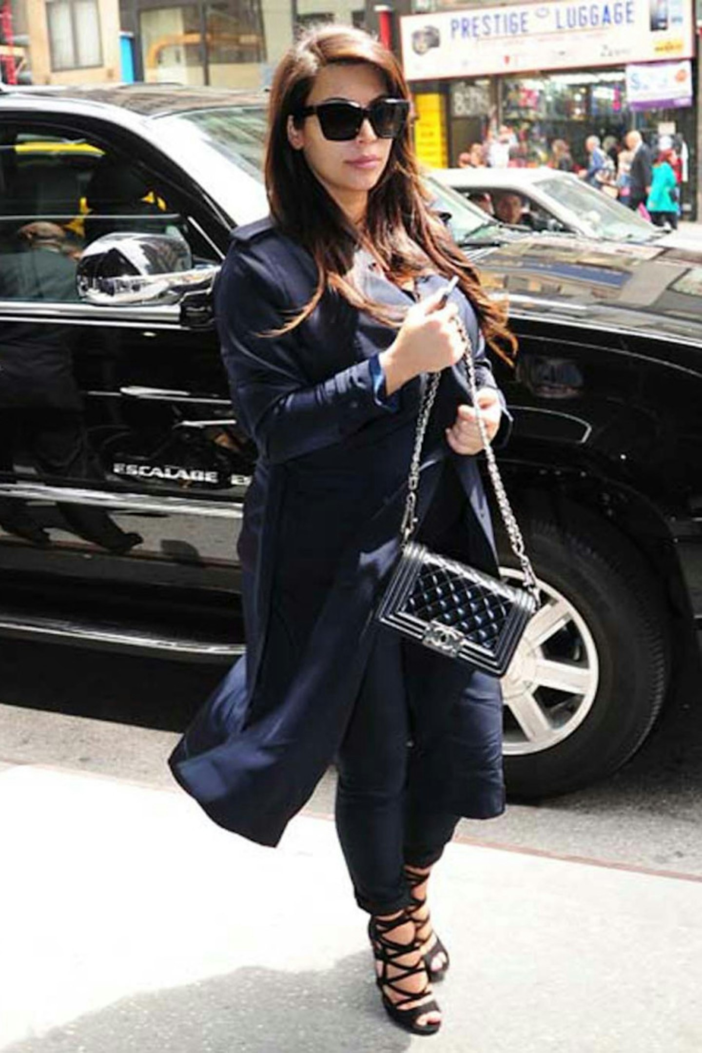 Kim Kardashian style navy coat new york