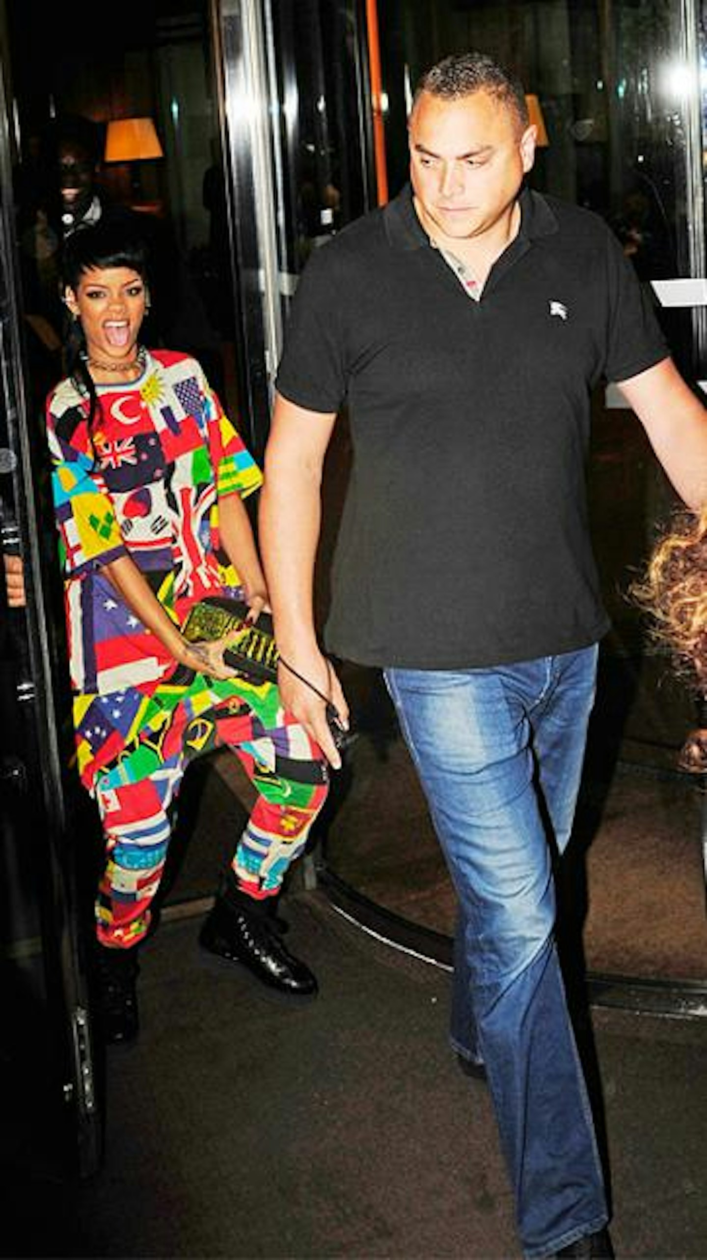 Rihanna playing a joke on her unsuspecting security guard...