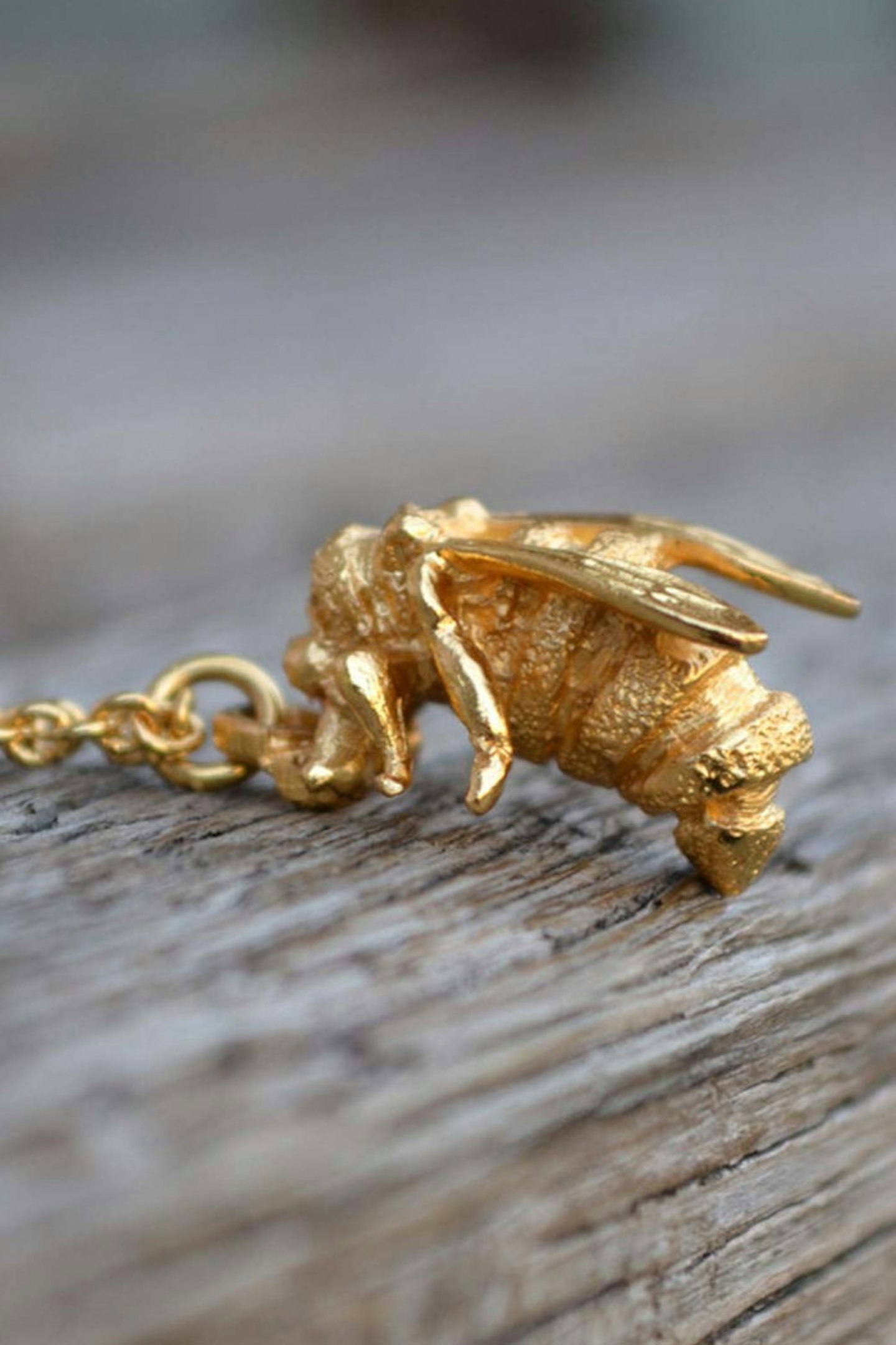 3. Bill Skinner Bee Pendant Gold Necklace
