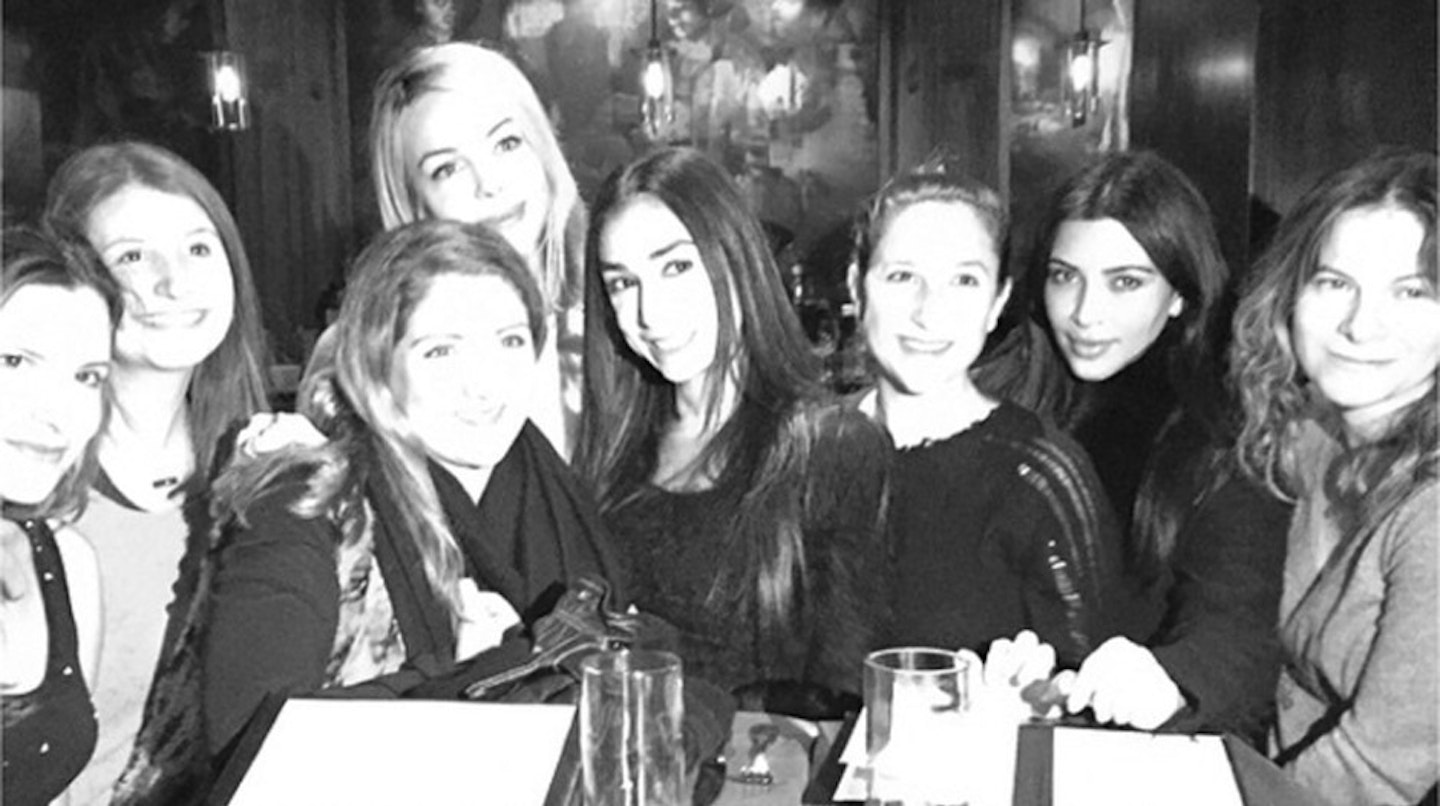 Amazing how Kim's in the only face that doesn't look overexposed, huh?