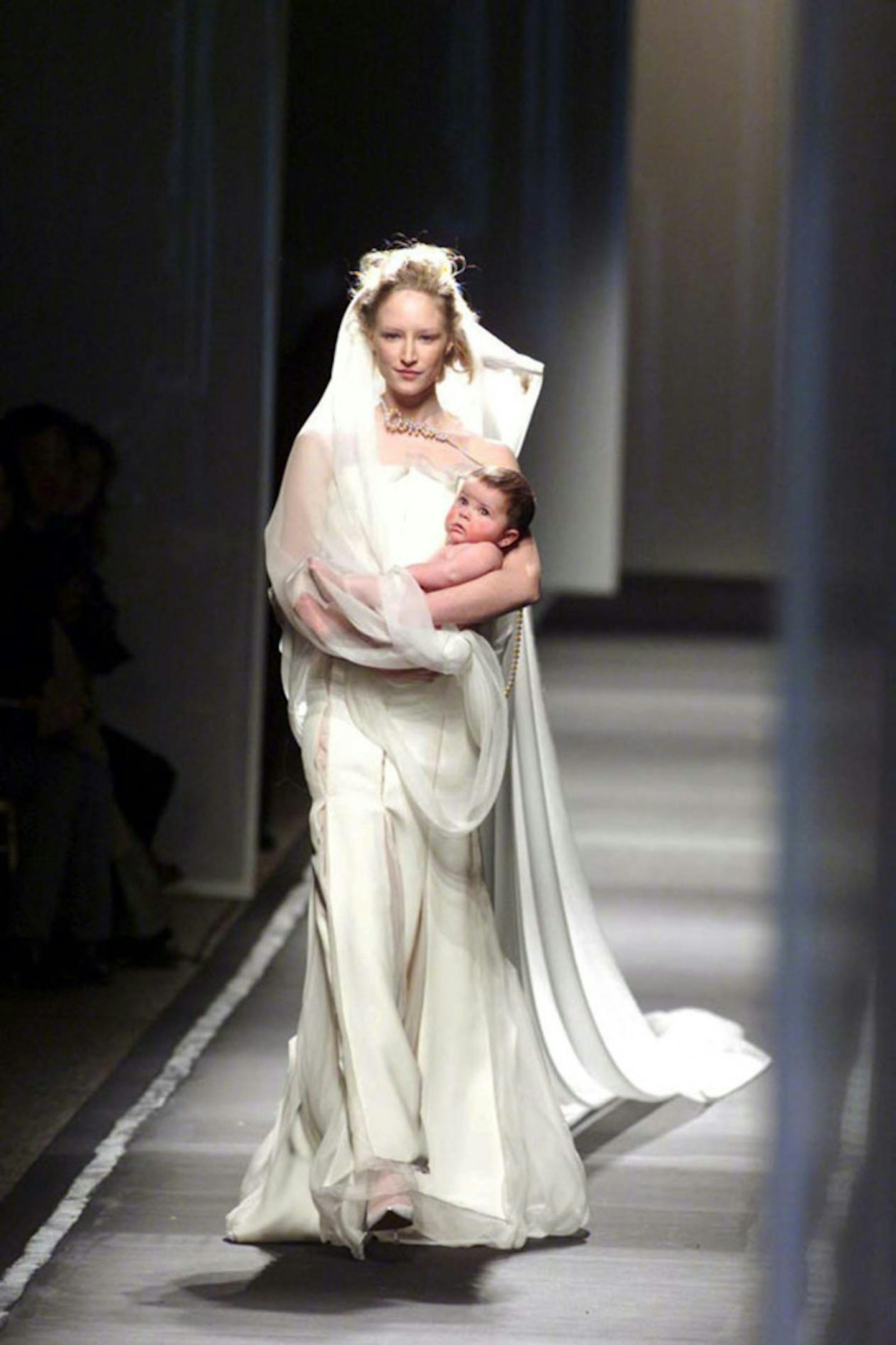 Jade Parfitt swaps a bridal bouquet for a baby in 2001.