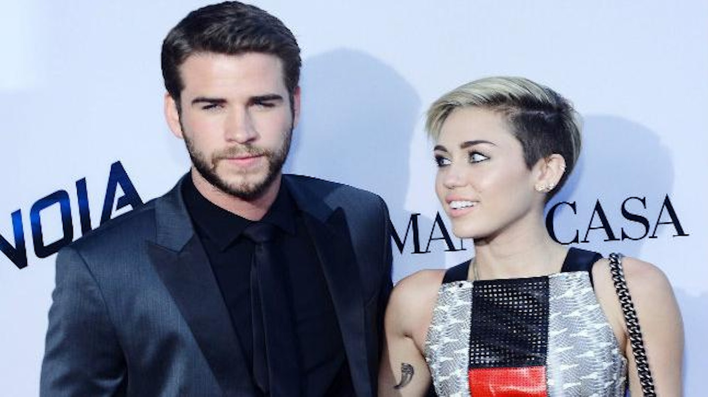 Miley and ex-fiance Liam Hemsworth pictured together in August