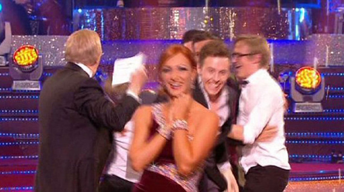 Bruce Forsyth shooing McFly off the dancefloor after Harry Judd won in 2011