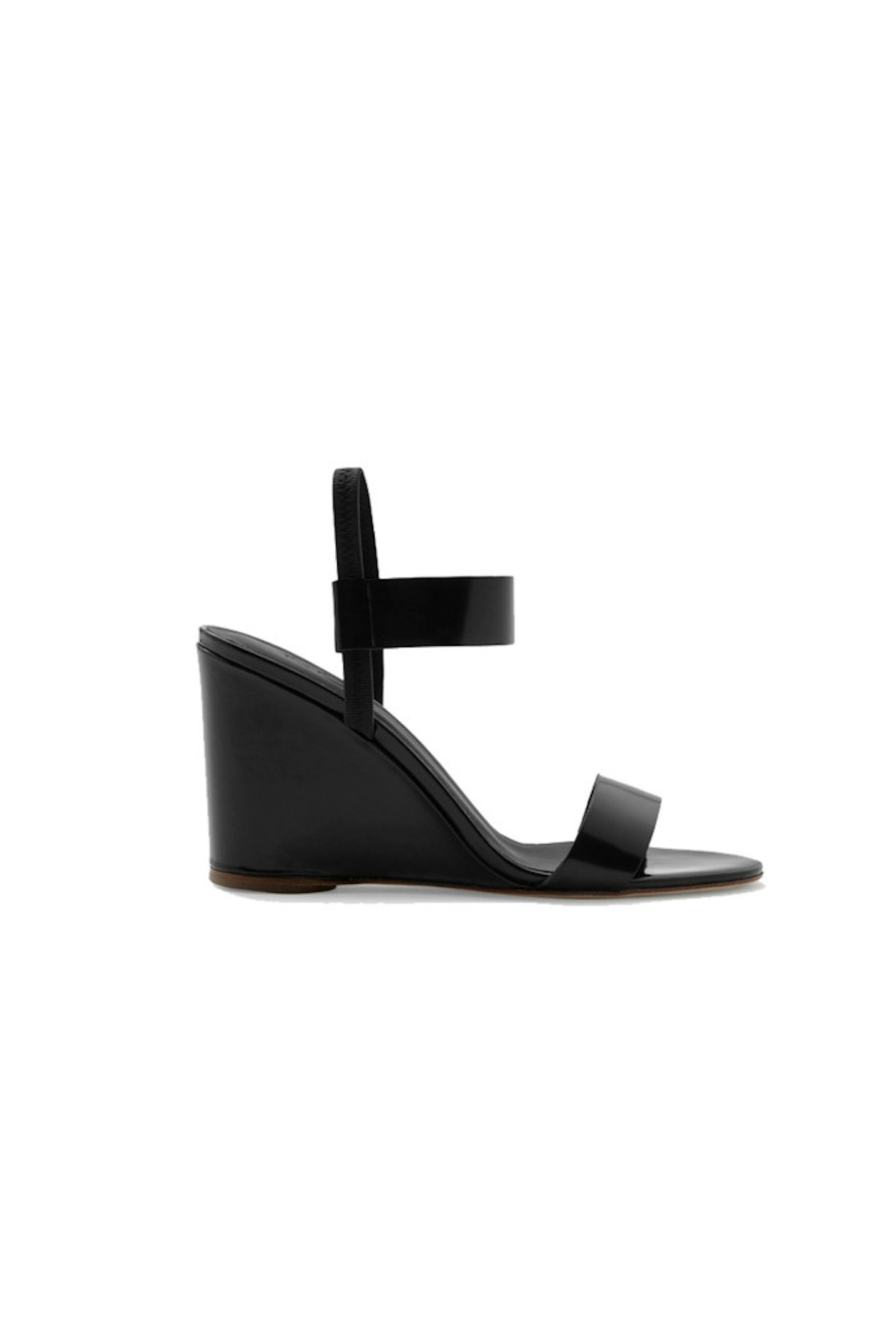 Buy as many crazy and fun shoes as you like but every woman needs a pair of simple black sandals like these in their wardrobe. The wedge gives height but is much comfortable to wear all day long than a spindly heel.