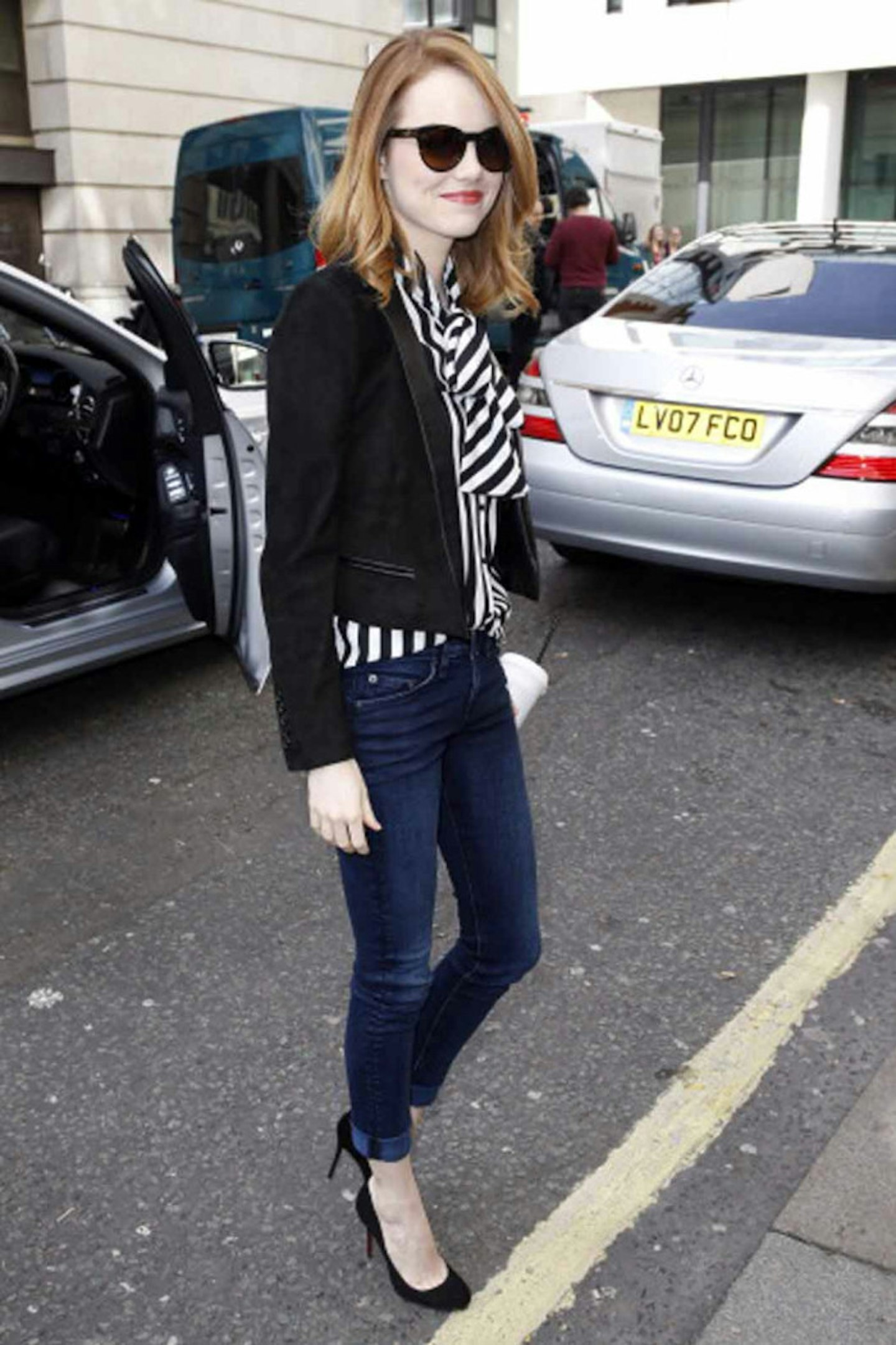 Emma Stone style striped blouse black blazer skinny jeans