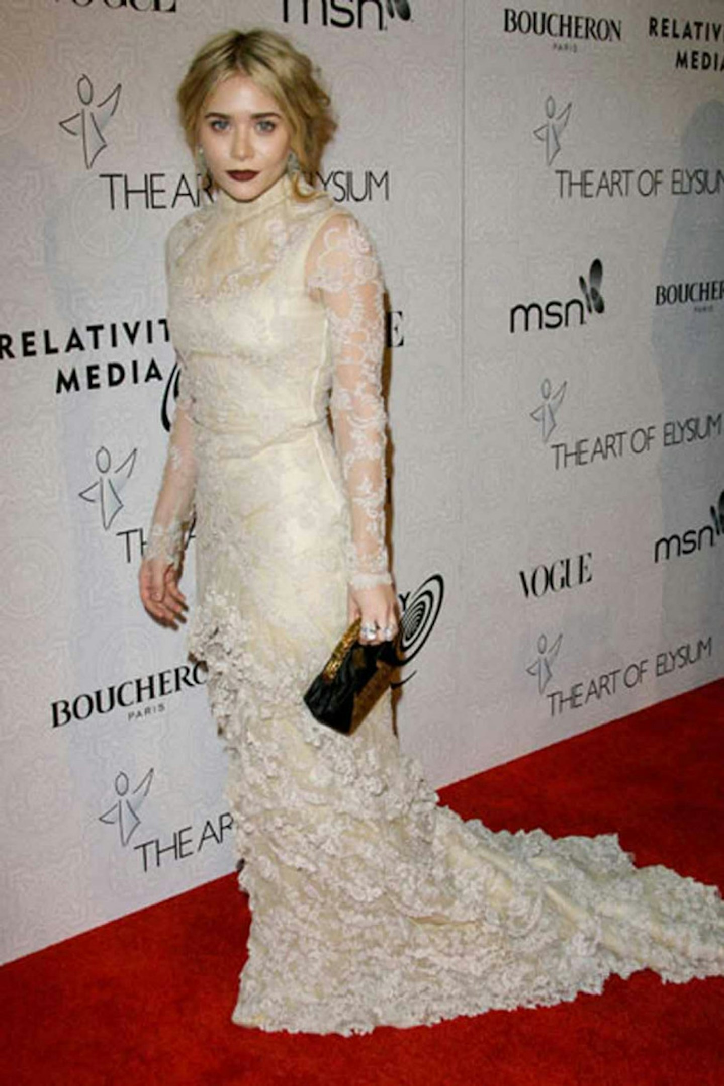 Ashley Olsen style alexander mcqueen lace high neck dress