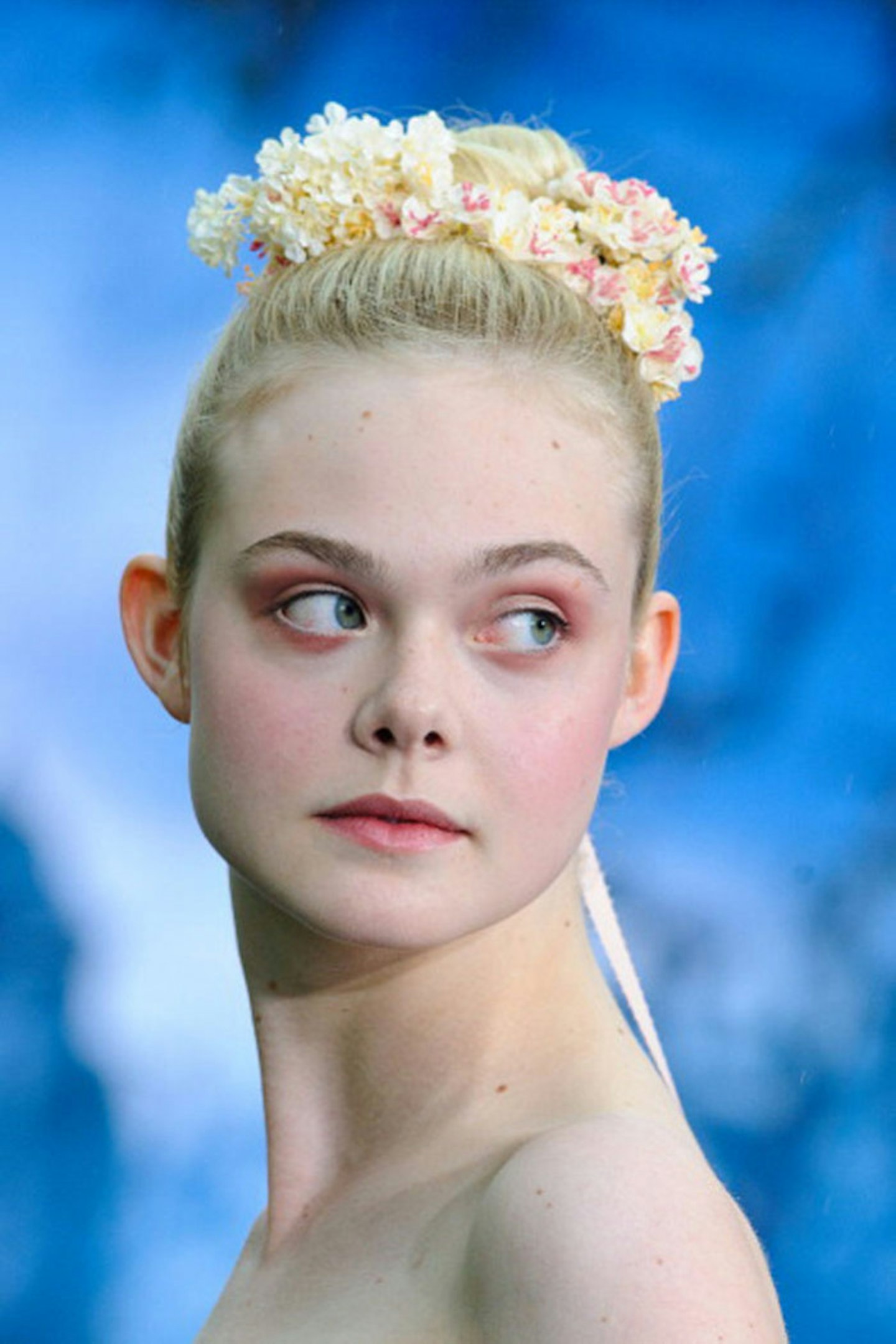 Add a floral accessory like Elle Fanning
