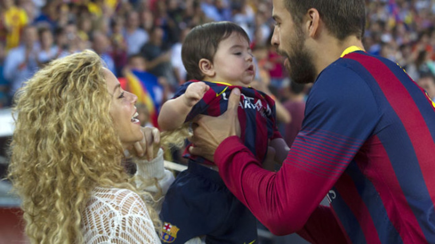 Shakira and Gerard with baby Milan (2011)