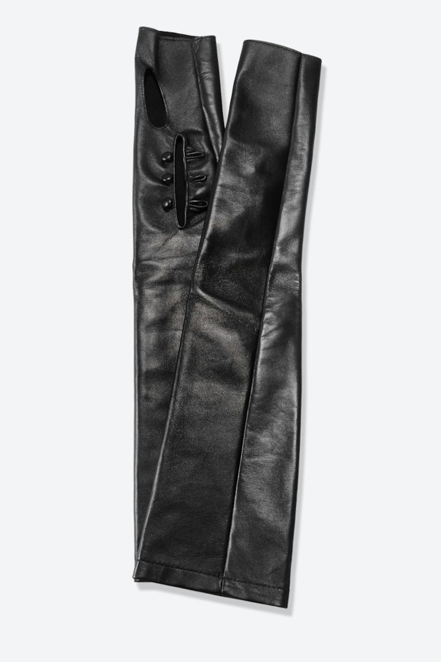 Toughen up your party look with these super sexy fingerless gloves by Margiela.