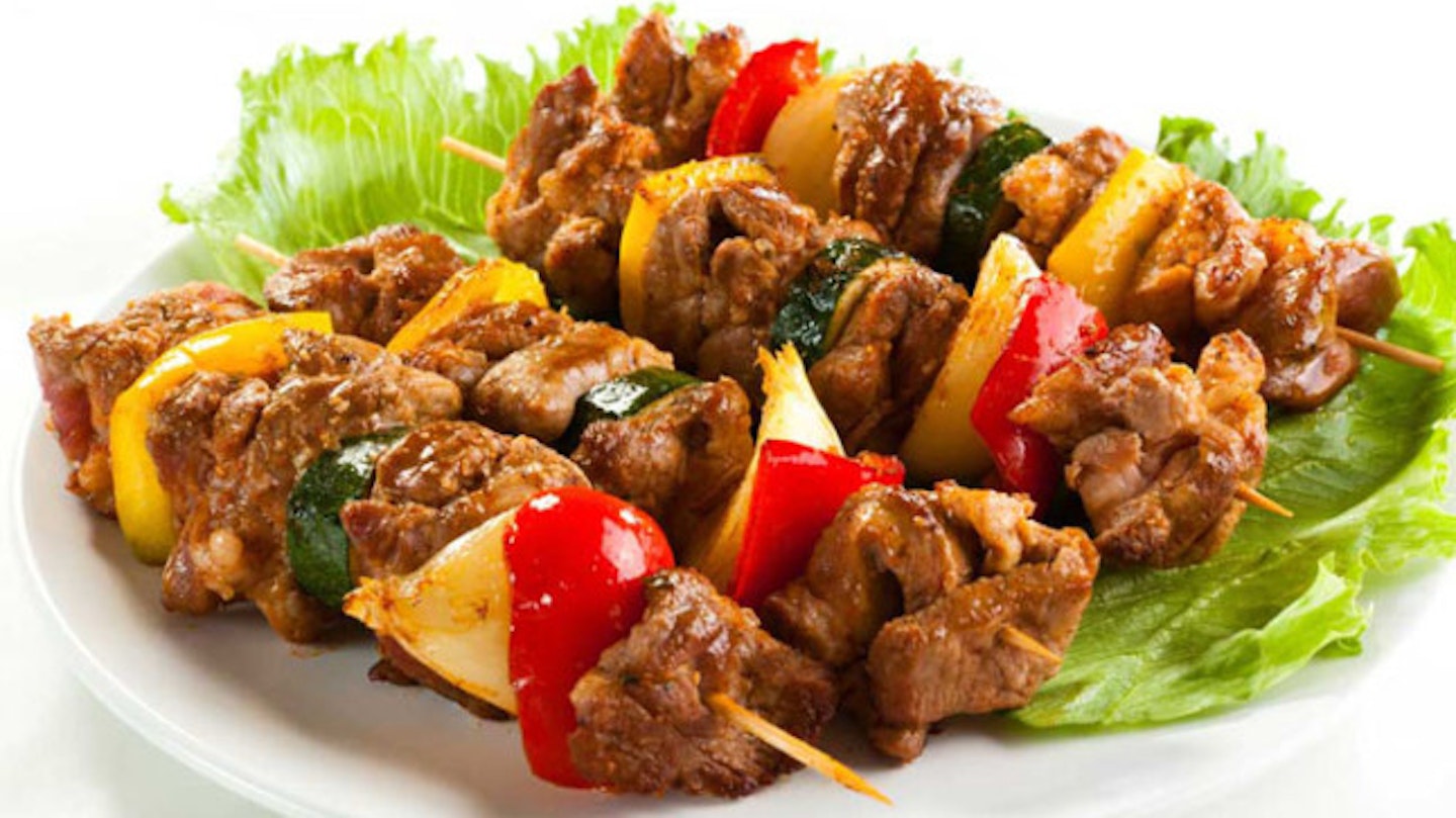 BEEF KEBABS (380 kcal per portion. Serves 6) Ingredients - Marinade Ingredients; 1/3 cup olive oil, 1/3 cup soy sauce, 3 Tbsp red wine vinegar, 1/4 cup honey, 2 cloves garlic, minced, 1 Tbsp minced fresh ginger and freshly ground black pepper to taste. Kebab Ingredients; 1 1/2 lbs top sirloin steak, cut into 1 1/2-inch cubes, 1 large bell pepper, 1-2 medium red onions, 1/2 to a pound button mushrooms and about 20 bamboo or wooden skewers.