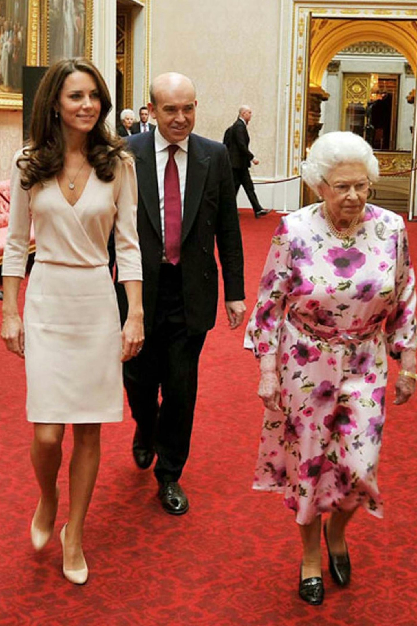 Kate Middleton touring the exhibitions for the summer opening of Buckingham Palace, July 2011