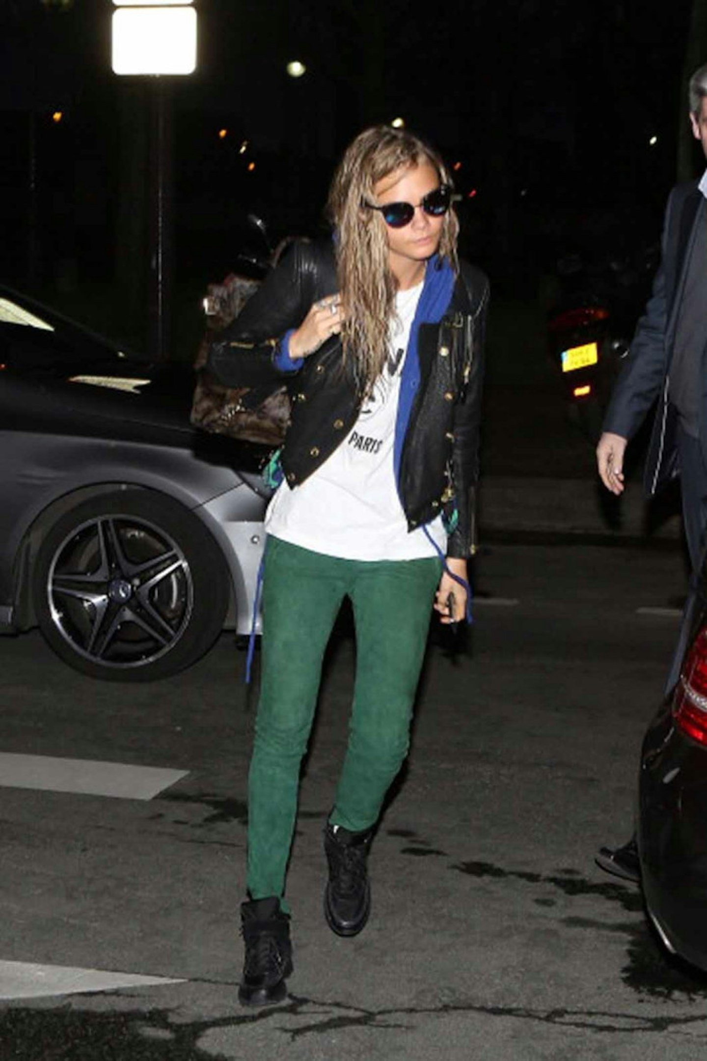 Cara Delevingne style leather jacket green trousers